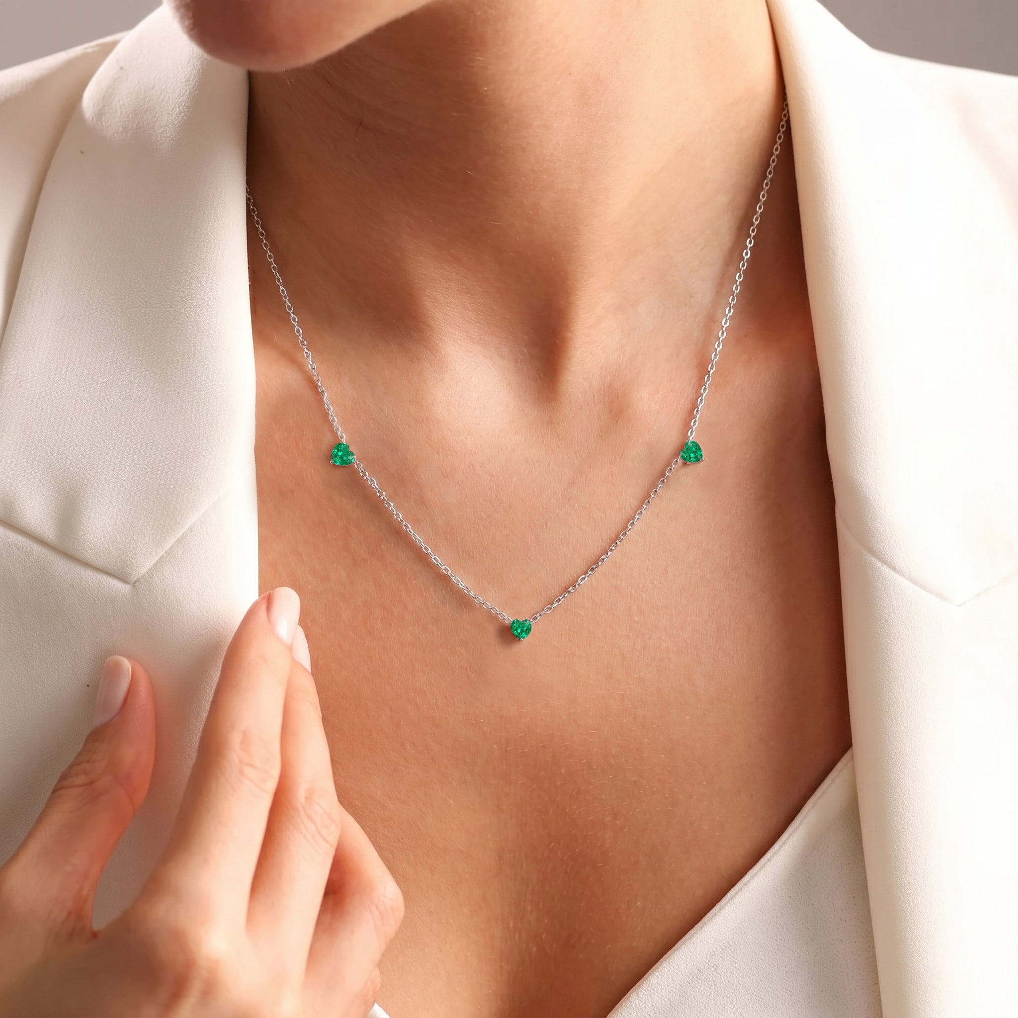 Minimalist AAA Emerald Heart Necklace handcrafted in Sterling Silver.
