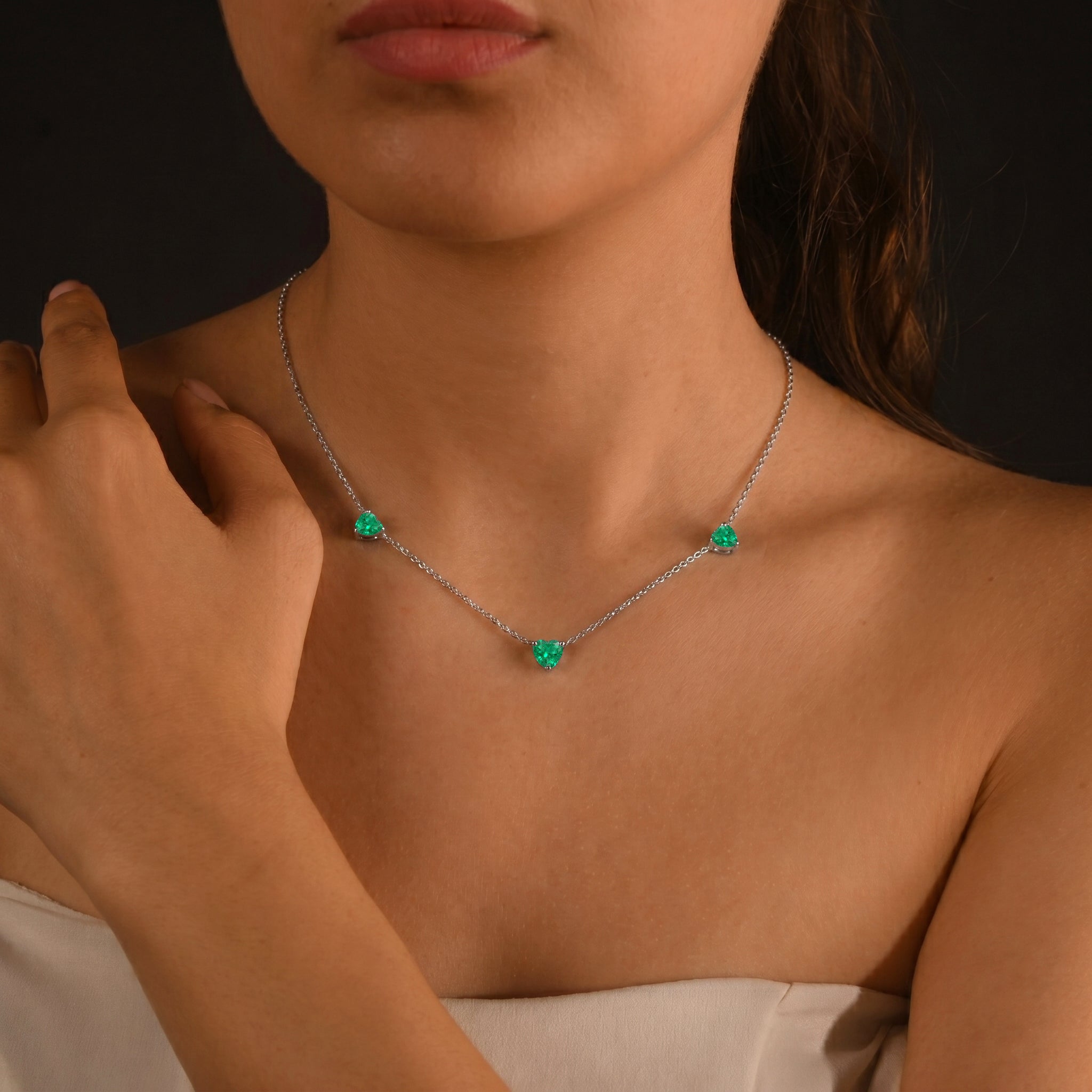 Emerald Three Stone Heart Necklace available in Sterling Silver and Gold Filled.
