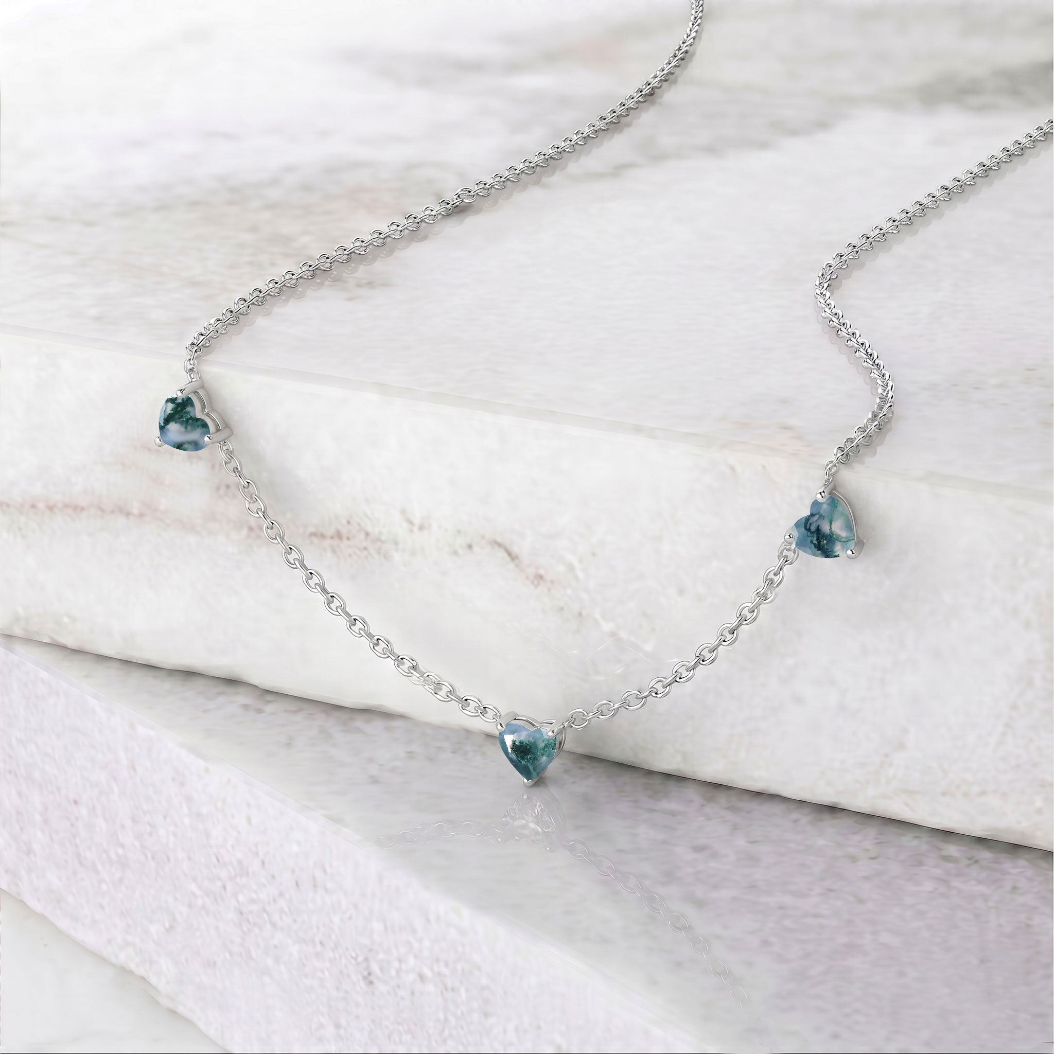 Genuine AAA Natural Moss Agate Heart Necklace with three 6mm heart-cut gemstones.
