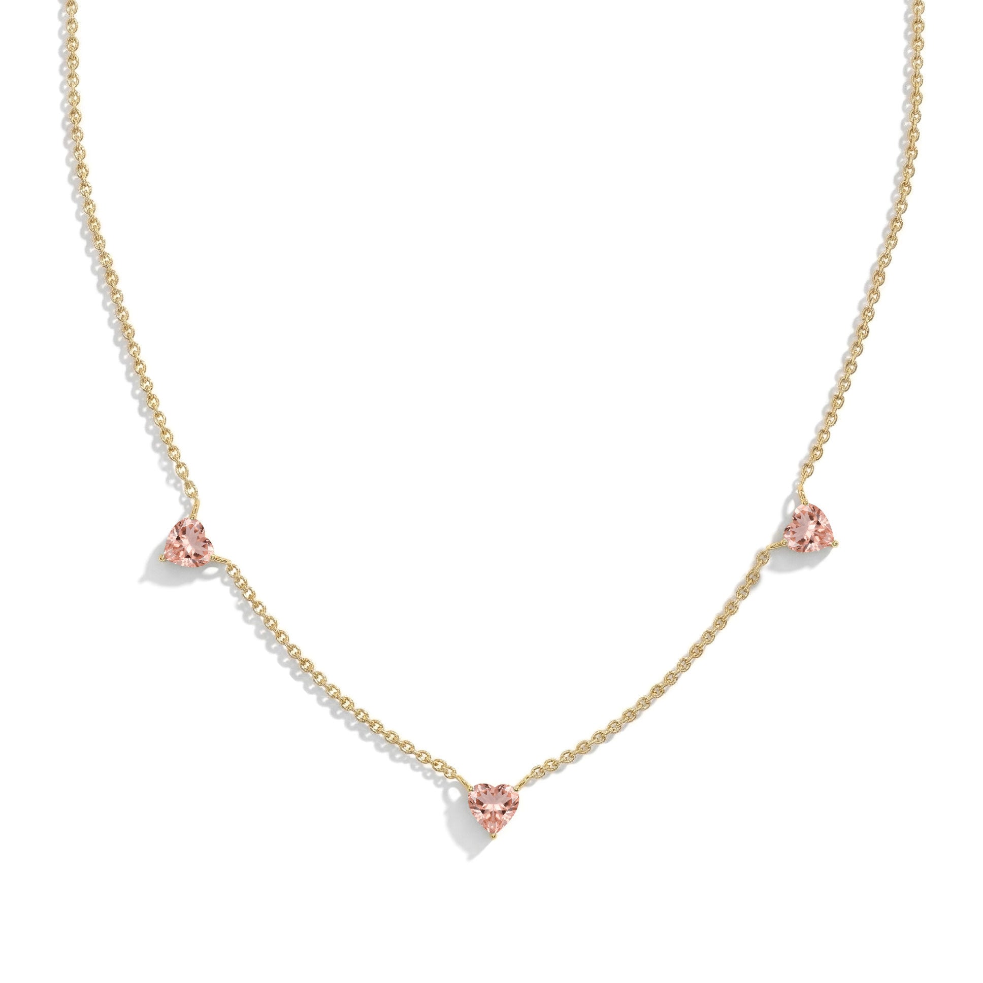 Fine jewelry Morganite necklace with three heart-shaped gemstones.
