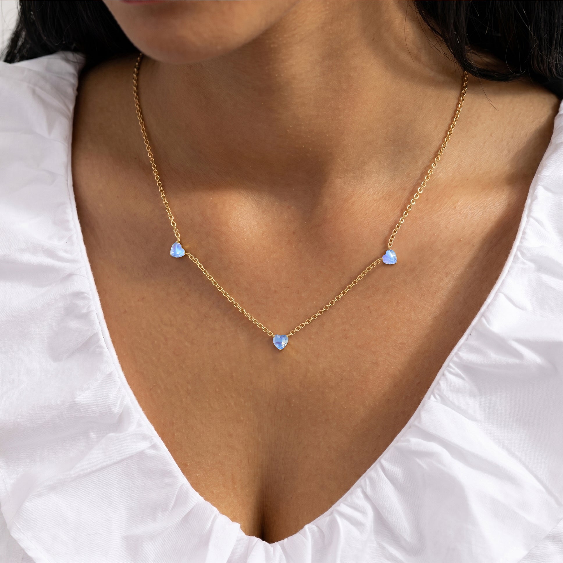 Three stone Natural Moonstone heart necklace with genuine 6mm gemstones on a 16-inch chain.
