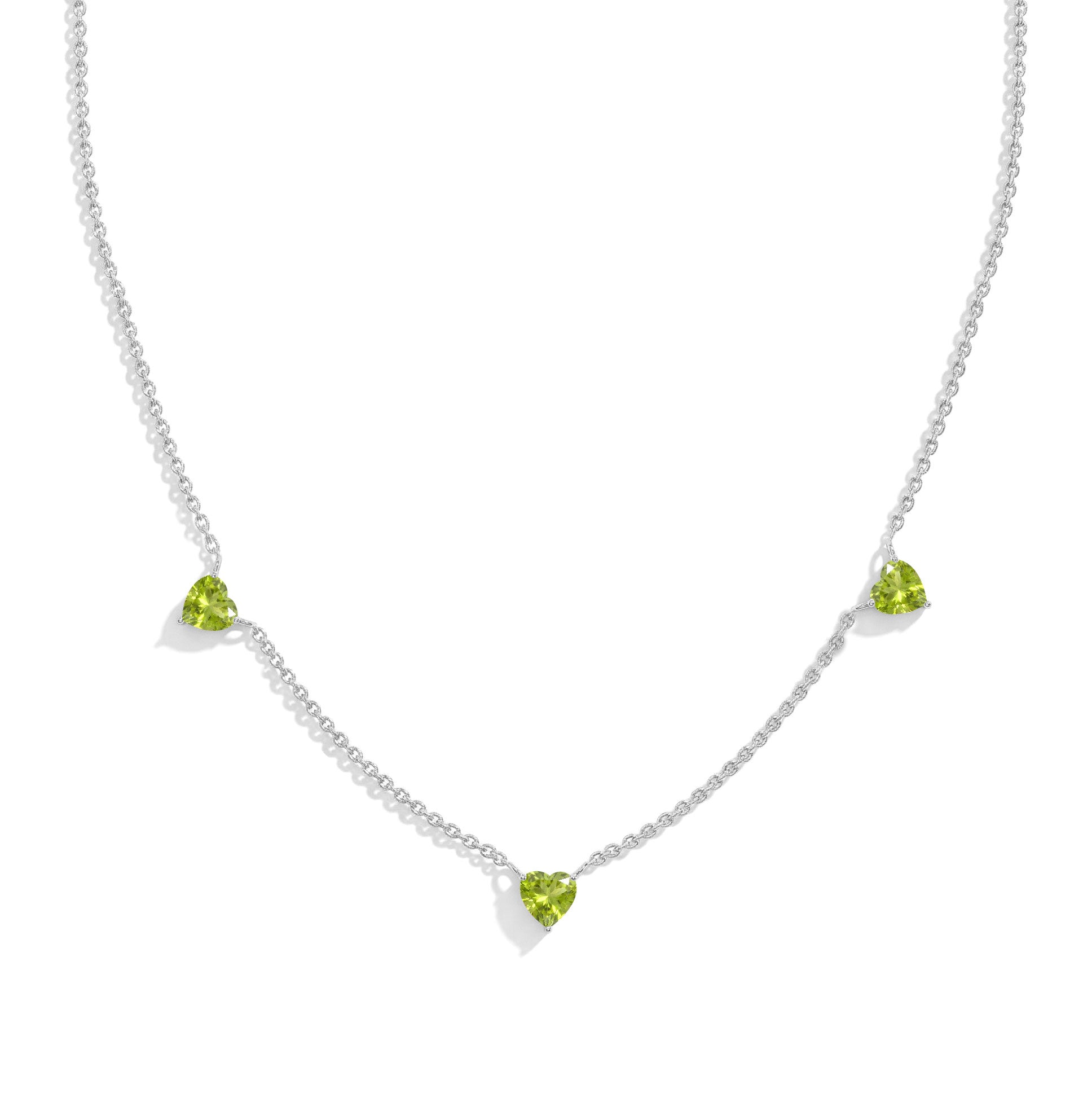 "AAA Grade Natural Peridot Three Stone Heart Necklace in 925 Sterling Silver with genuine heart-cut gemstones.
