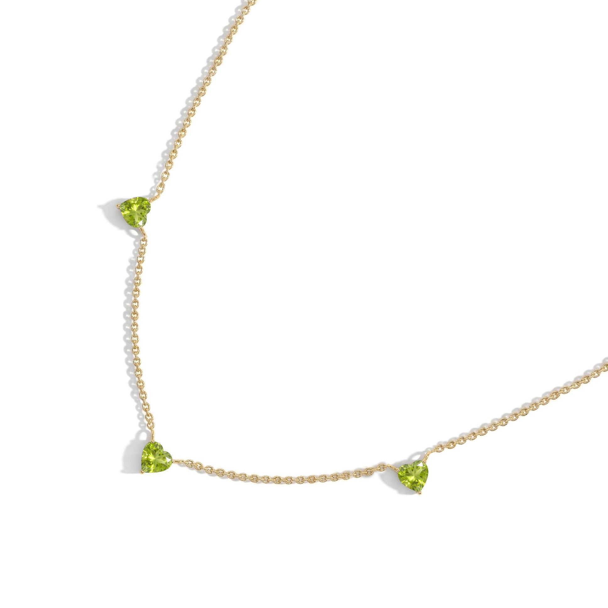 Natural Peridot Heart Necklace on a delicate 16-inch chain for everyday wear.
