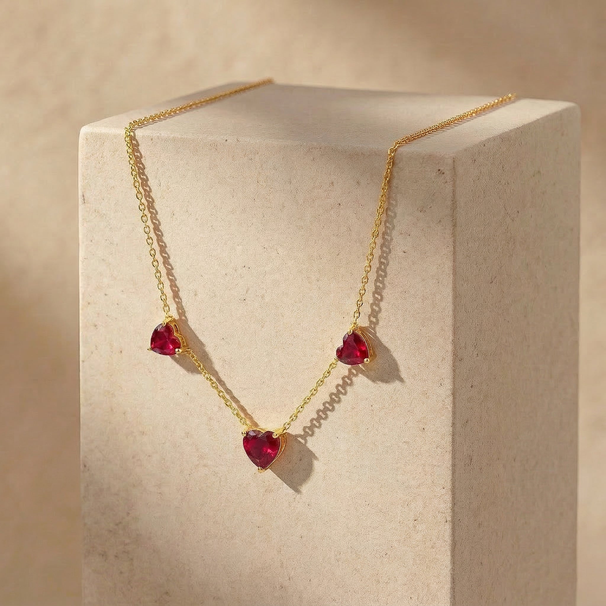 Minimalist Ruby Heart Necklace handcrafted in 925 sterling silver.
