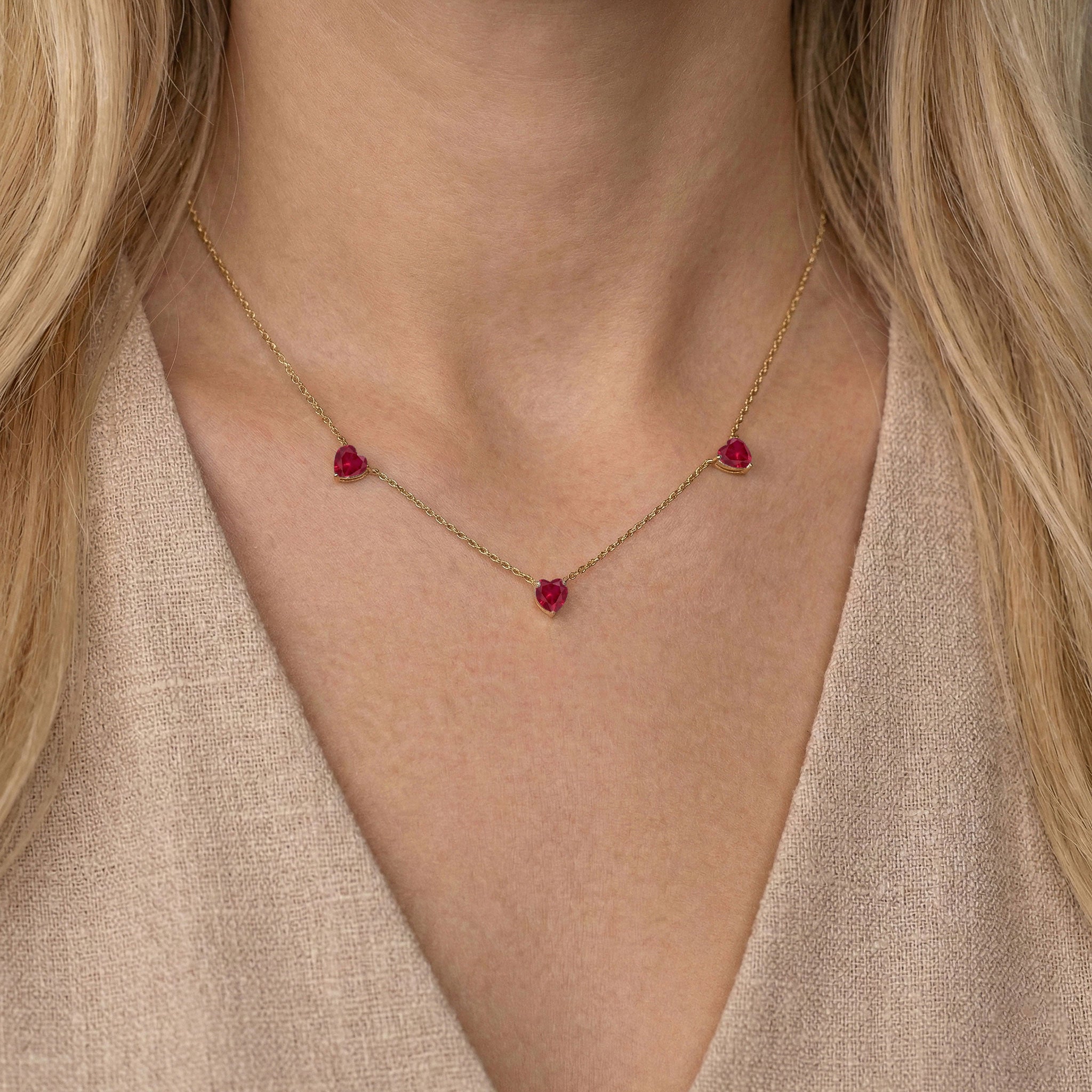 Natural Ruby necklace with heart gemstones on a delicate chain for women.
