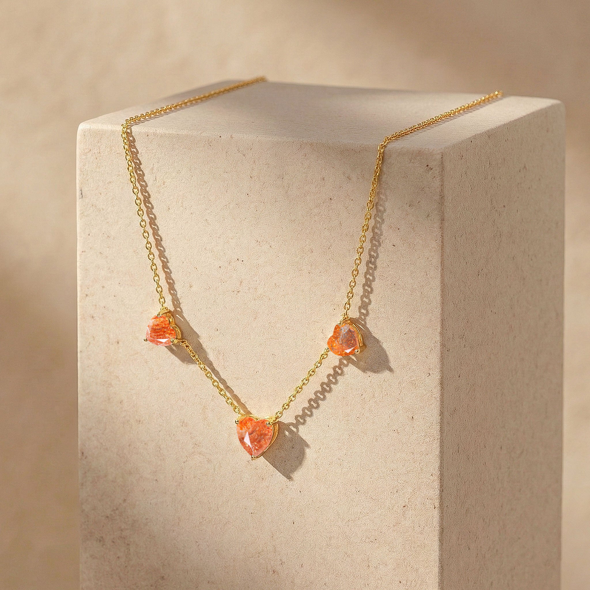 Natural Sunstone heart gemstone necklace in 925 sterling silver for everyday wear.
