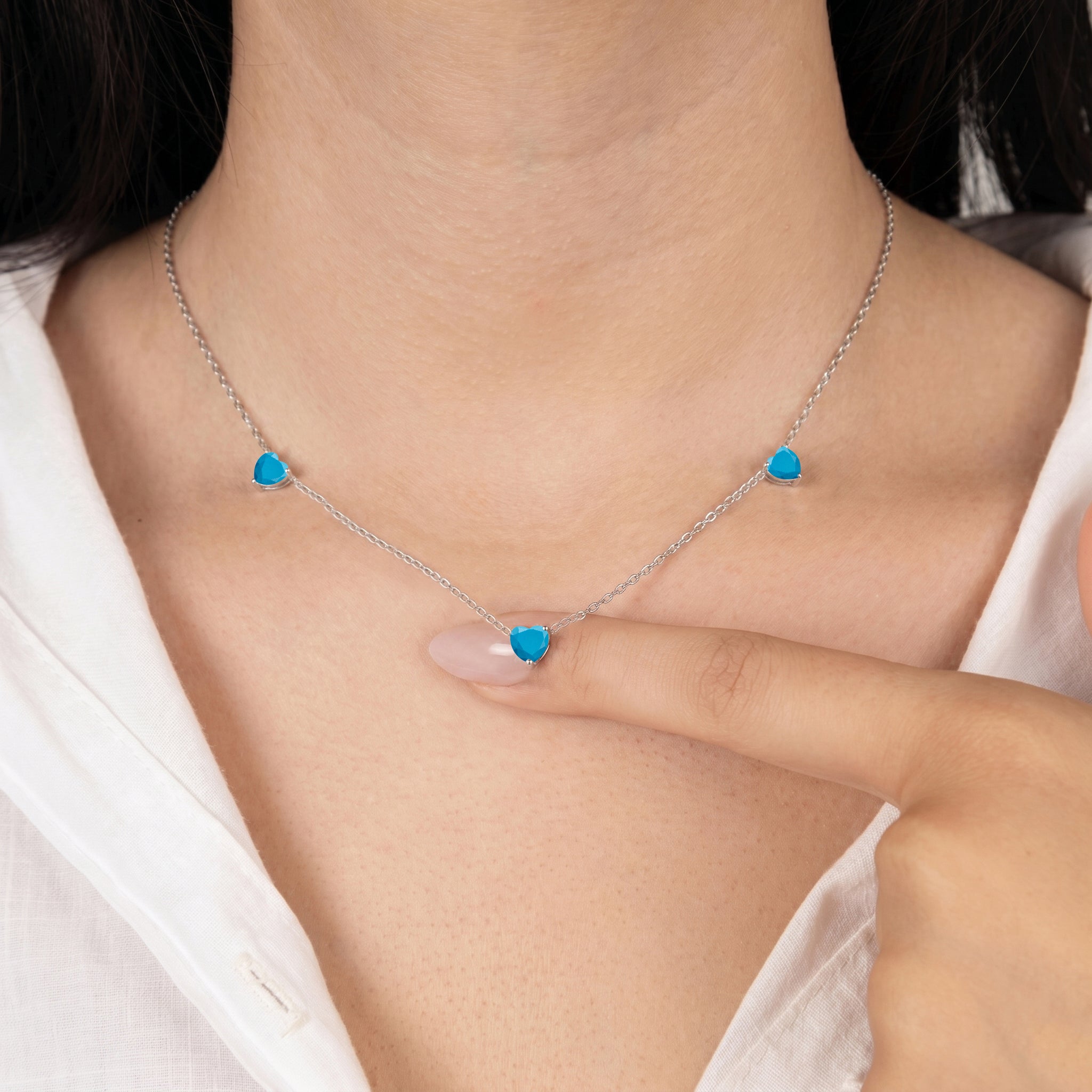 	Natural Turquoise Heart Necklace on a delicate 16-inch chain for everyday wear.
