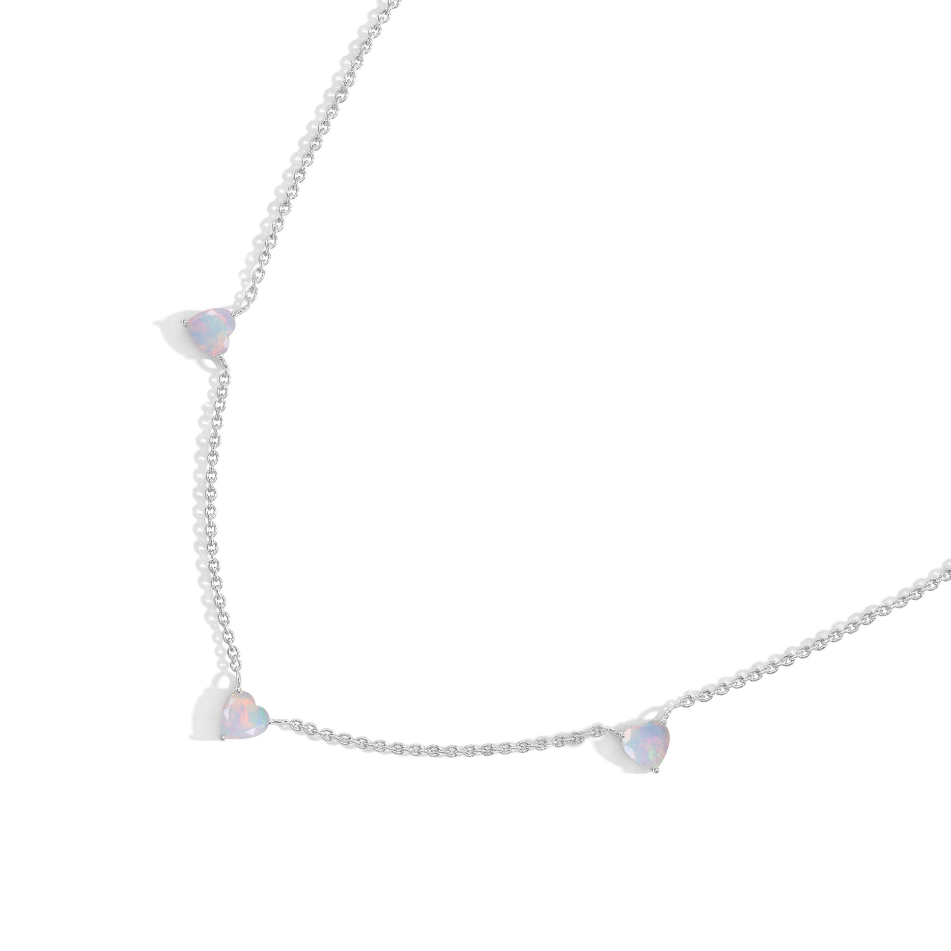 Handmade White Opal Three Stone Heart Necklace in Yellow Gold Filled featuring natural gemstones.
