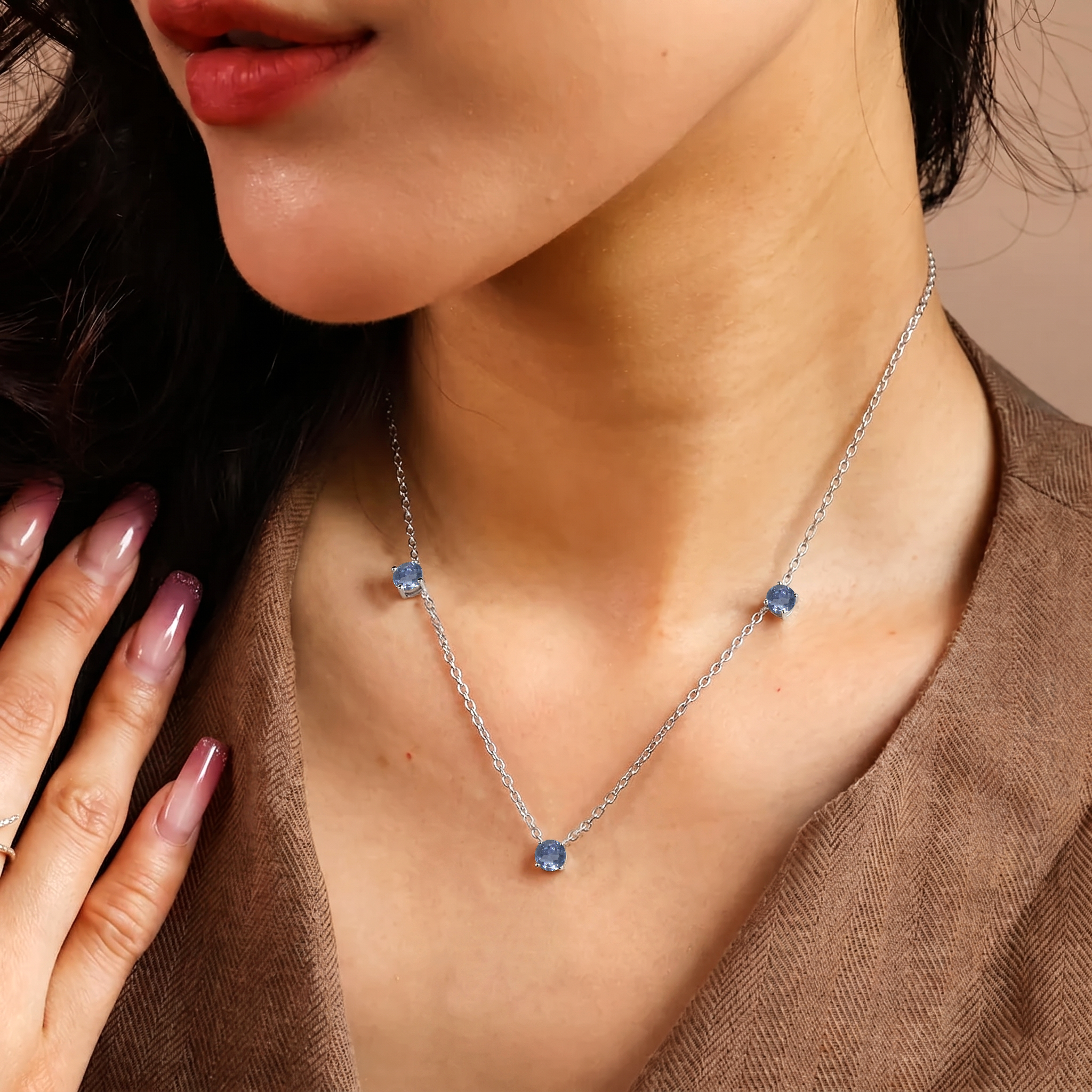 Rare gemstone necklace featuring three round Alexandrite stones for women.
