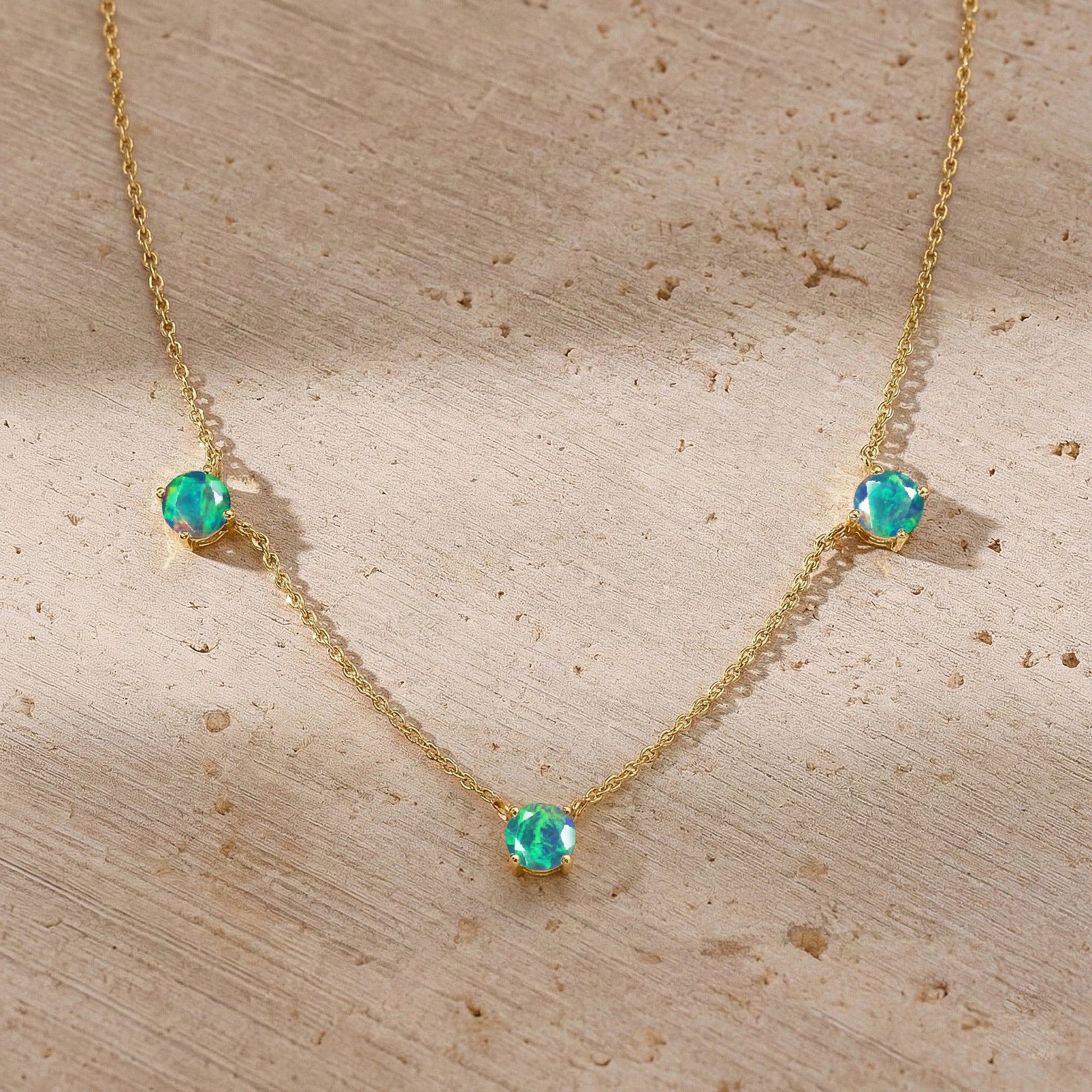 Beautiful Black Opal station necklace available in sterling silver and yellow gold filled.
