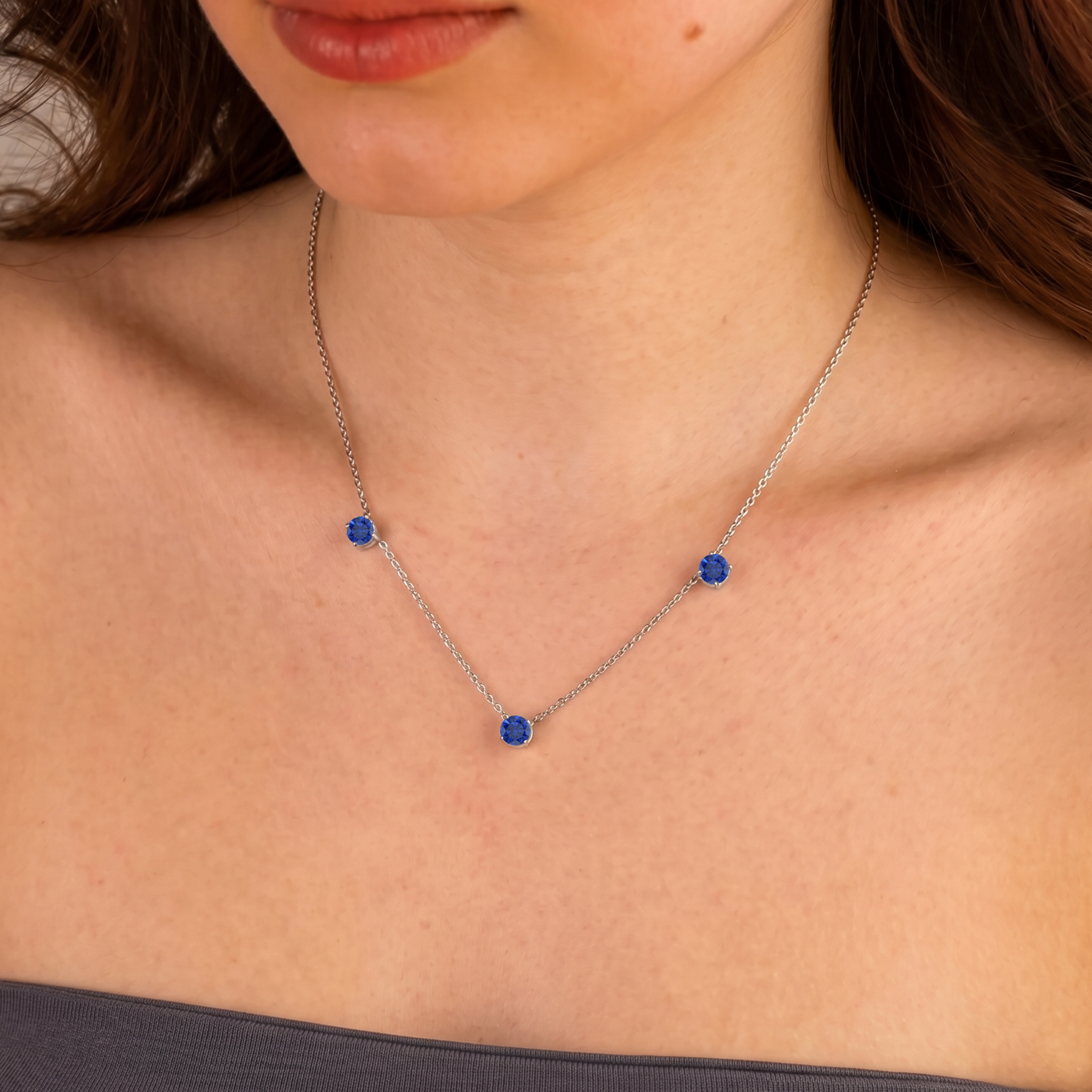 Handmade Blue Sapphire gemstone necklace crafted with a delicate sterling silver chain.

