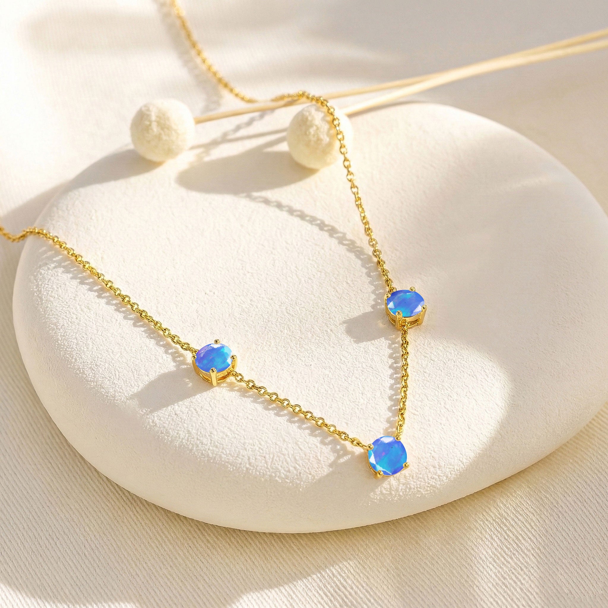 Beautiful Blue Opal station necklace available in sterling silver and yellow gold filled.
