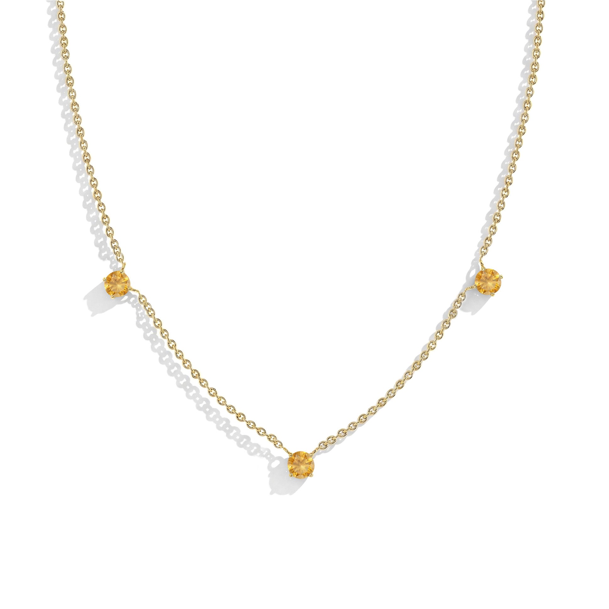 "Dainty Citrine necklace featuring three 5MM round gemstones in 925 Sterling Silver.

