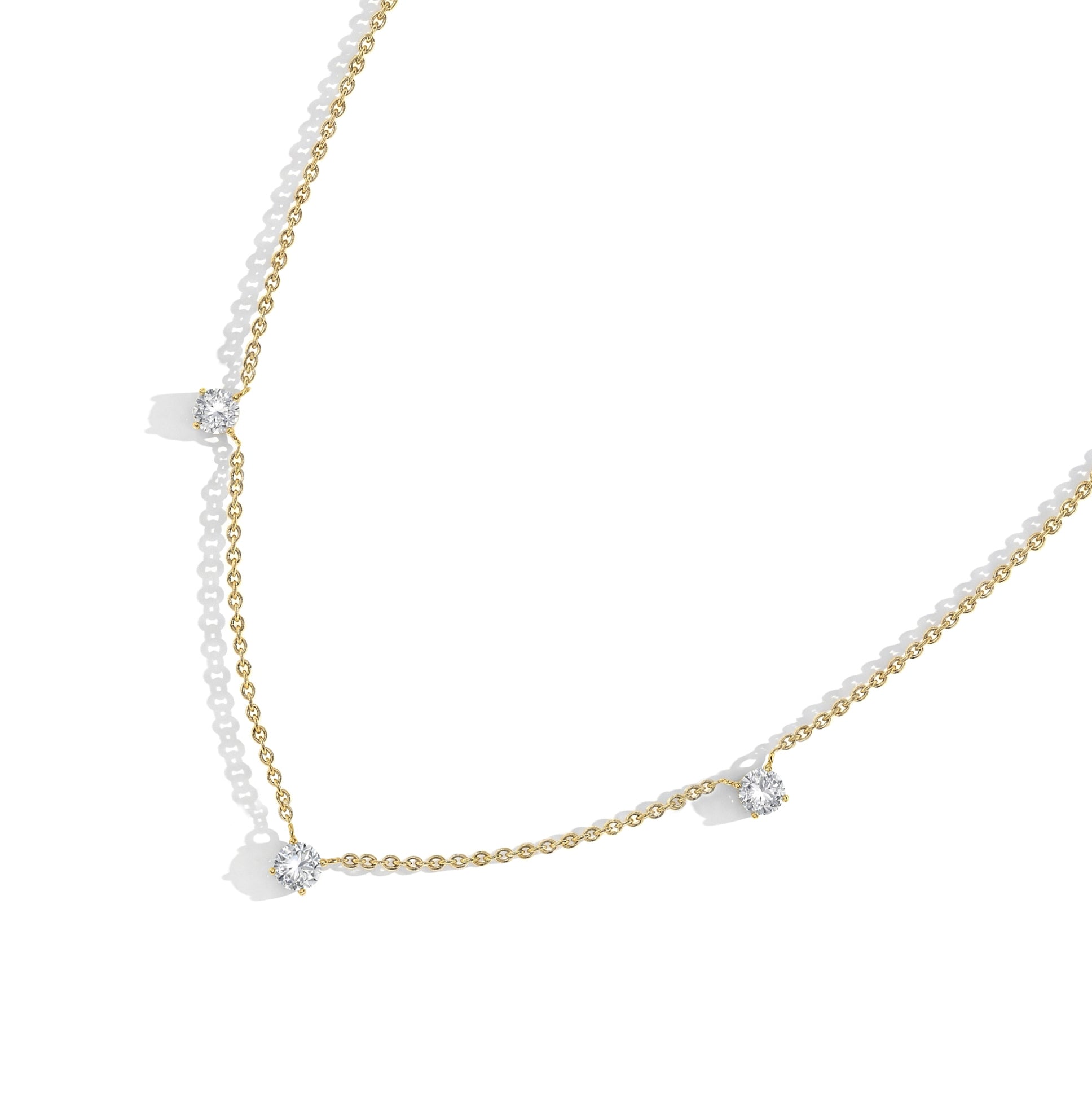 Moissanite gemstone station necklace with a modern minimalist look.
