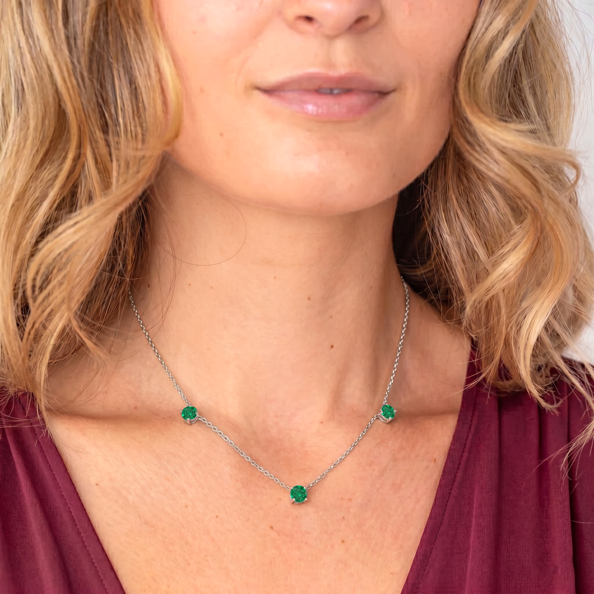 Handmade Emerald gemstone necklace crafted with a delicate sterling silver chain.
