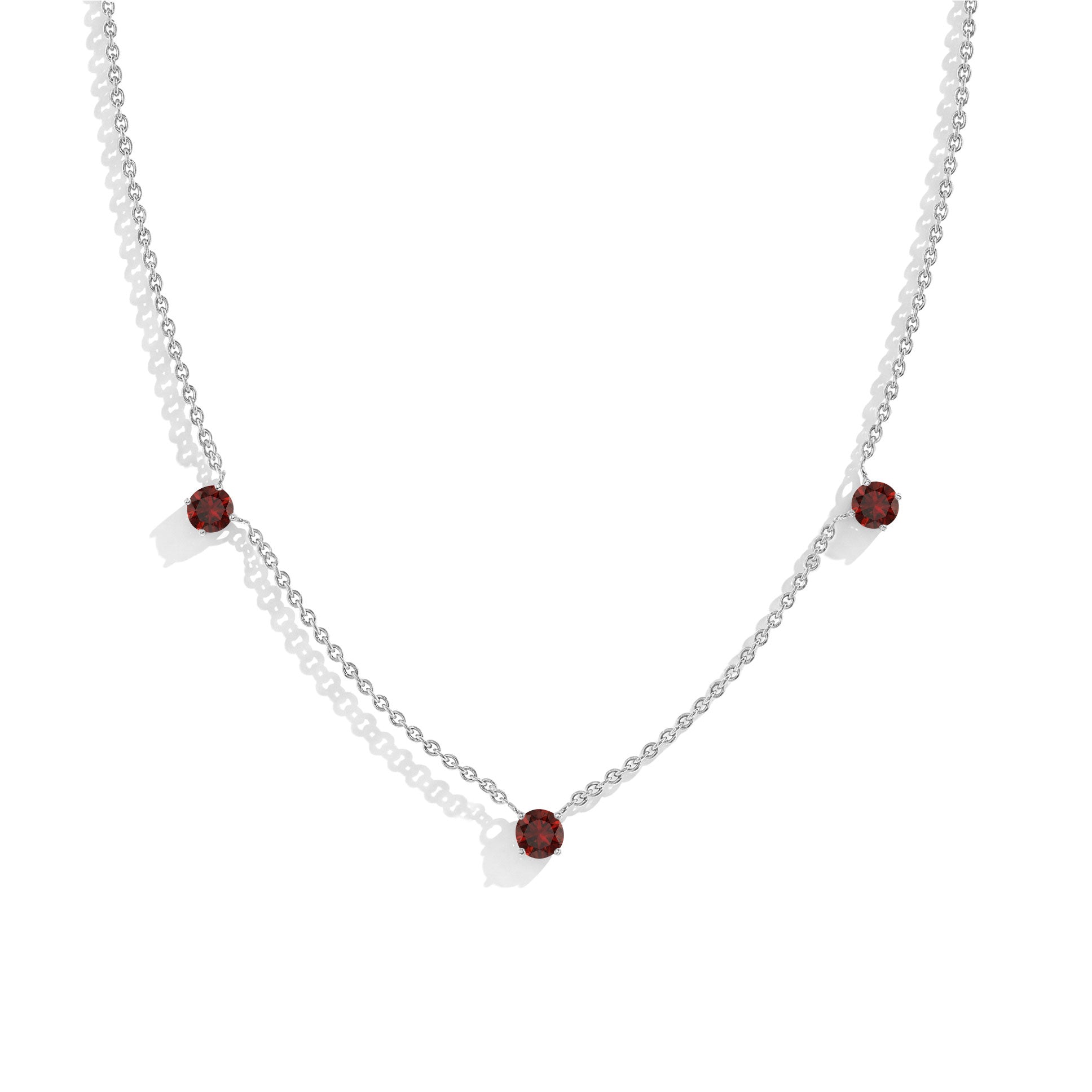 "Dainty Garnet necklace featuring three 5MM round gemstones in 925 Sterling Silver.

