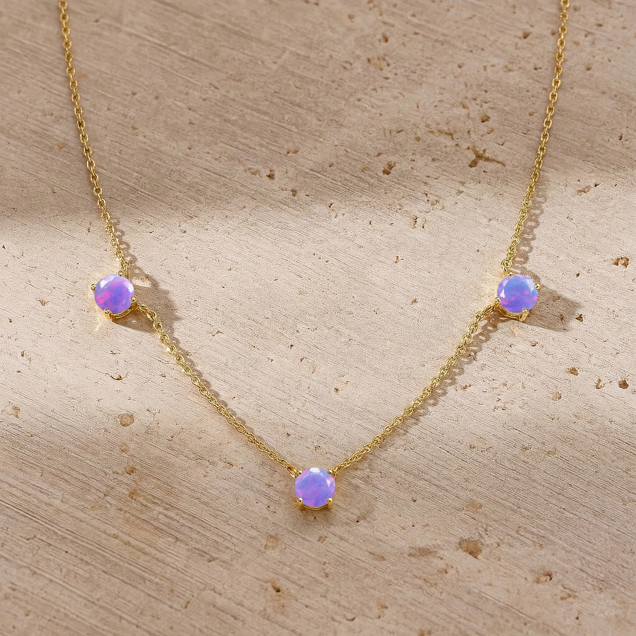 Lavender Opal station necklace available in sterling silver and yellow gold filled designs.
