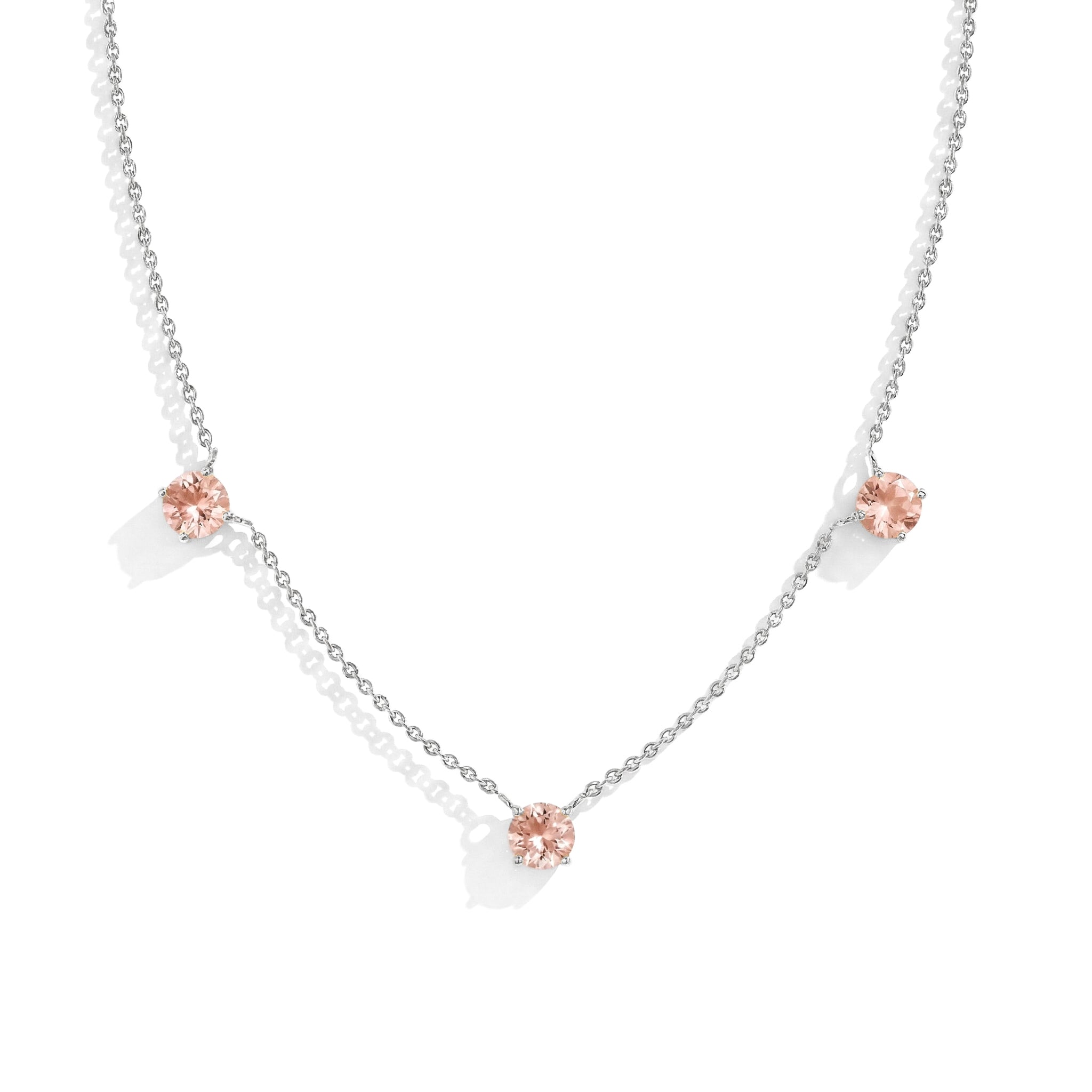 "Dainty Morganite necklace featuring three 5MM round gemstones in 925 Sterling Silver.
