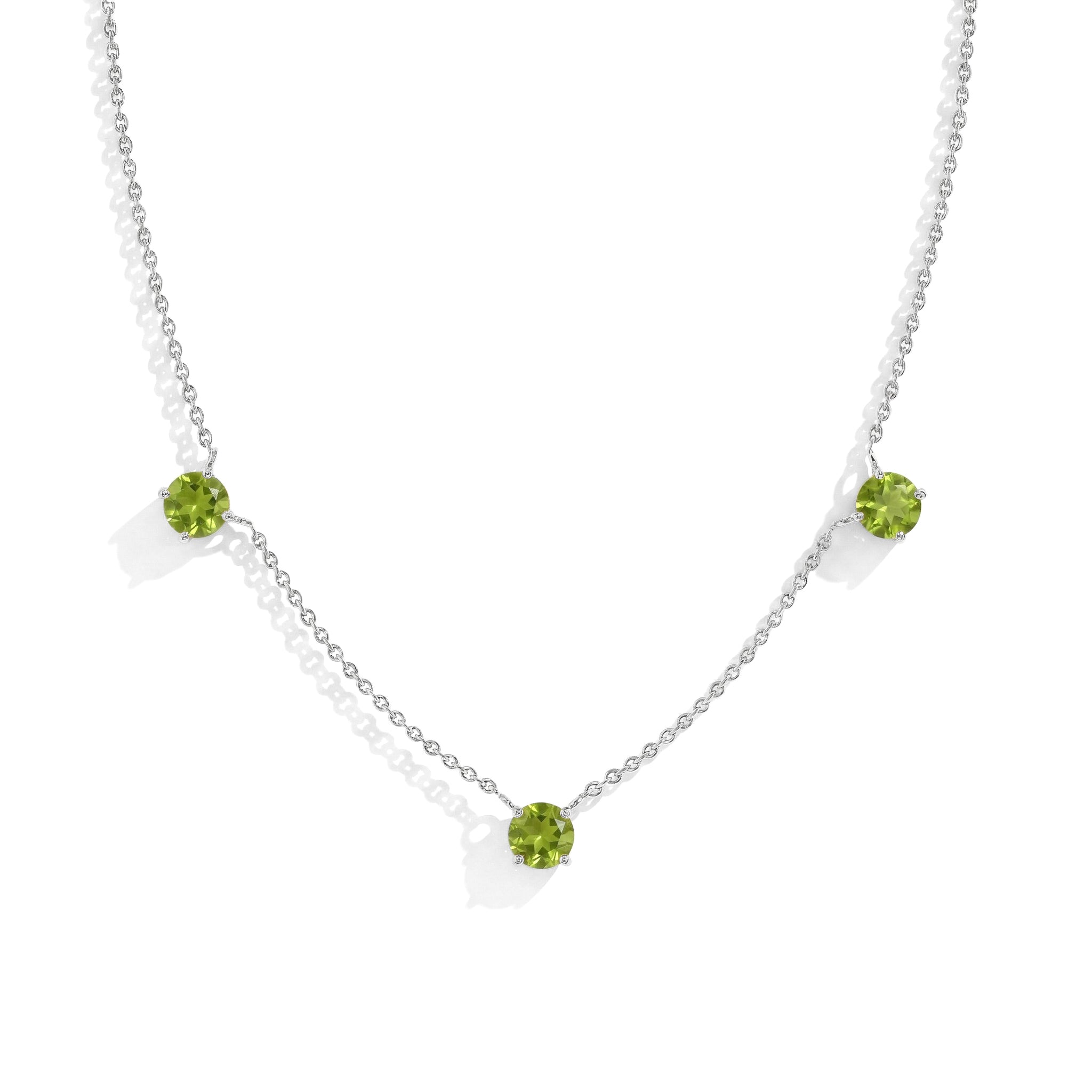 "Dainty Peridot necklace featuring three 5MM round gemstones in 925 Sterling Silver.

