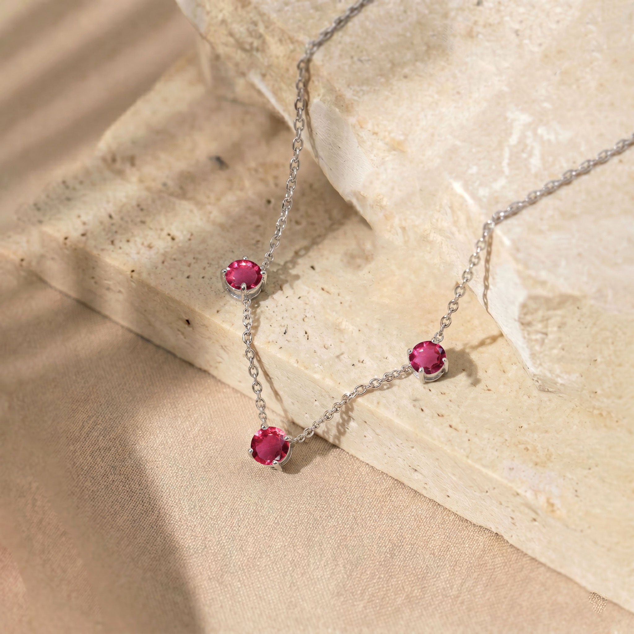 Three stone Pink Tourmaline necklace designed with a minimalist and timeless jewelry style.
