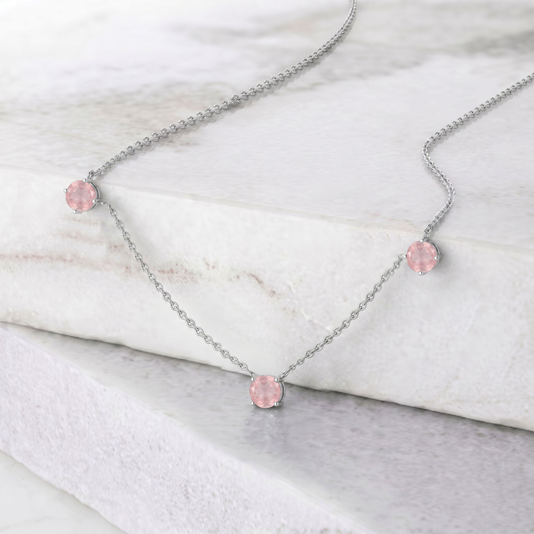 Three stone Rose Quartz necklace designed with a minimalist and timeless jewelry style.
