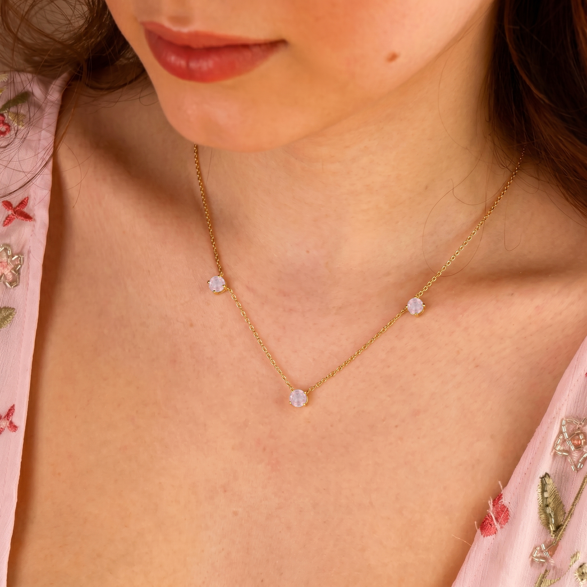 Genuine Rose Quartz gemstone necklace featuring three round stones for women.
