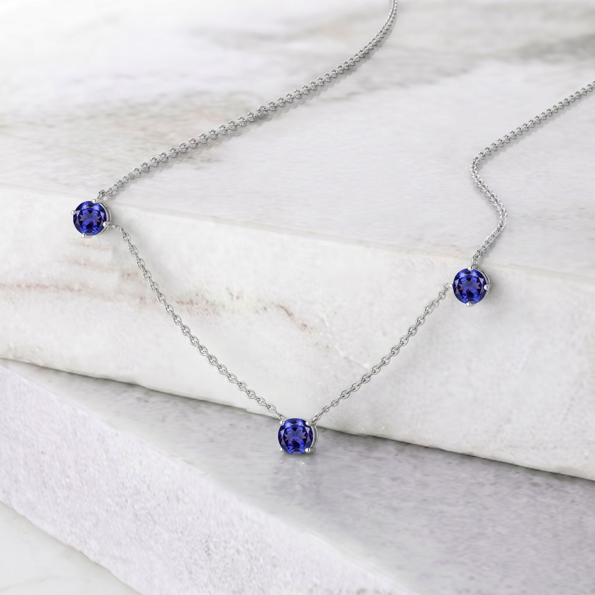 925 Sterling Silver Tanzanite necklace with adjustable 16 inch chain and extender.
