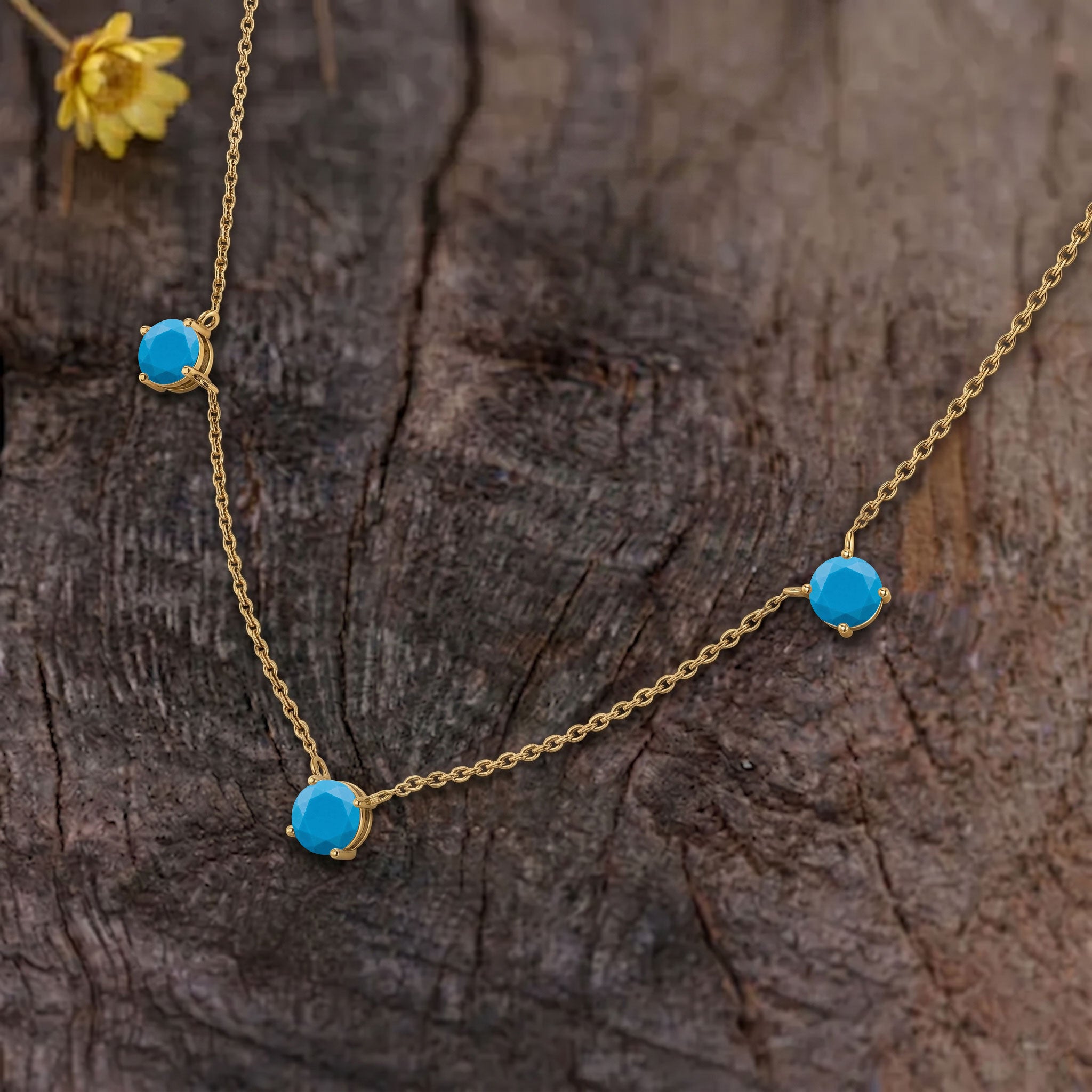 Turquoise station necklace available in sterling silver and yellow gold filled designs.
