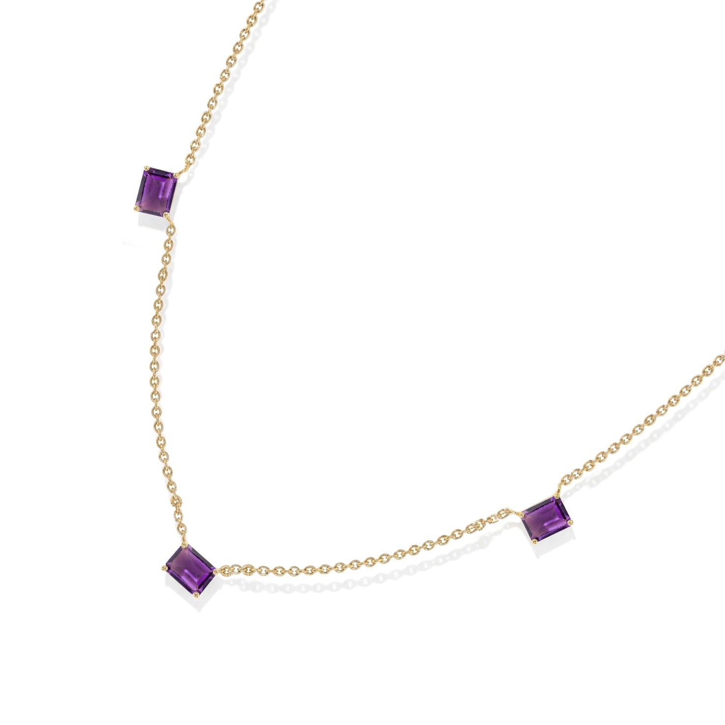 Fine jewelry Amethyst station necklace with three octagon-cut gemstones.
