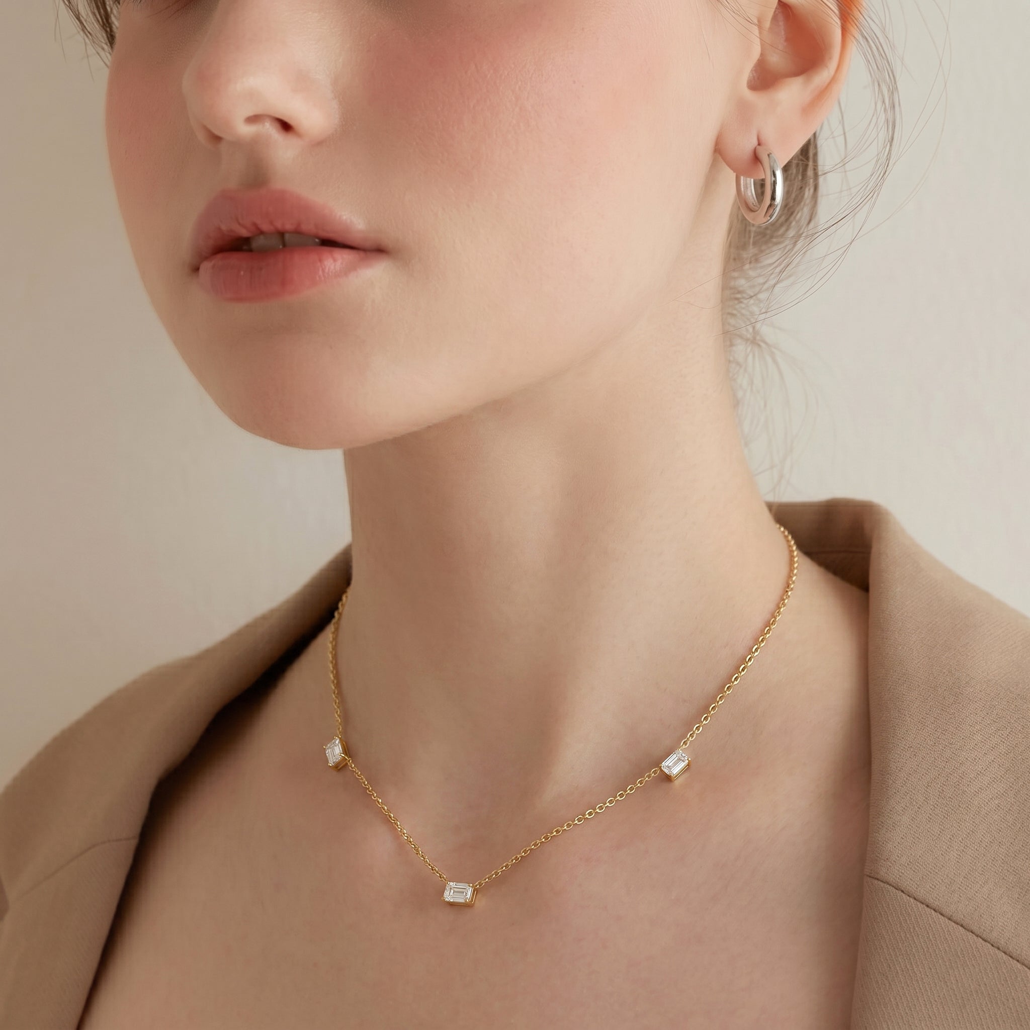 Delicate Moissanite station necklace in Sterling Silver.
