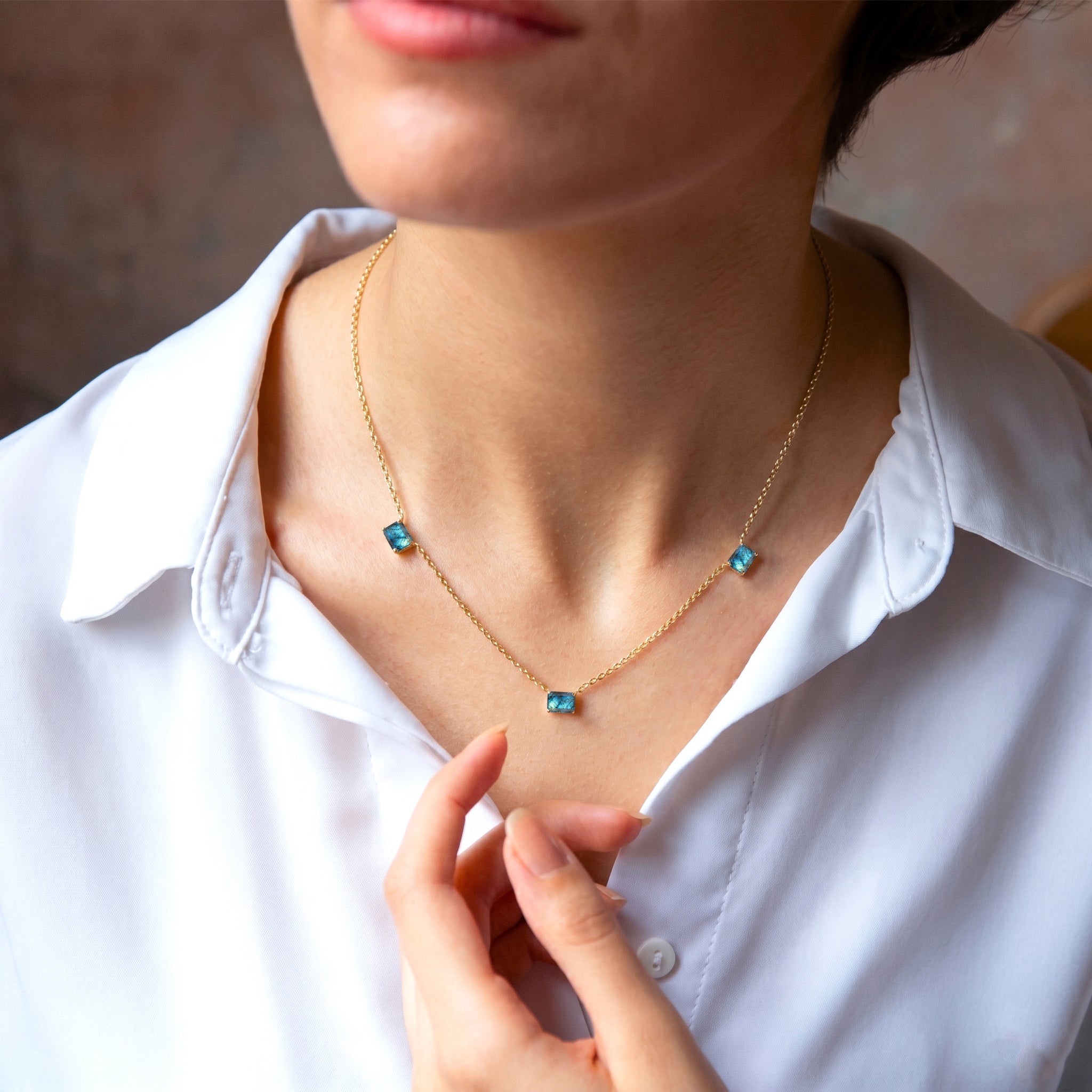 Elegant three stone Labradorite necklace with octagon-cut gemstones.
