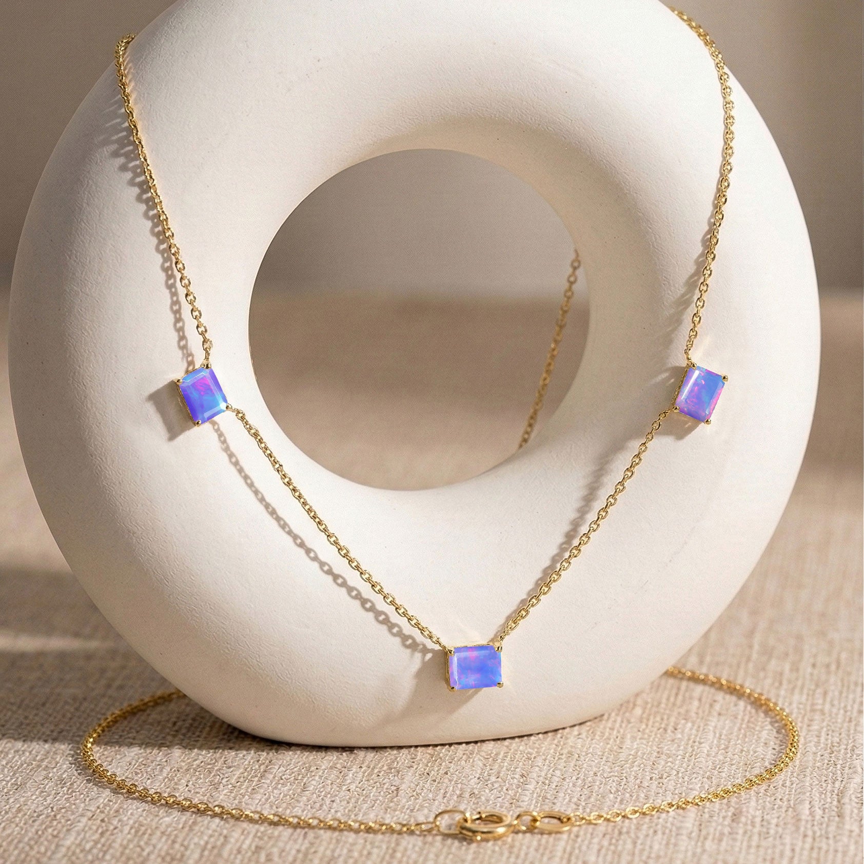 Three stone Natural Lavender Opal necklace with soft lavender gemstones.
