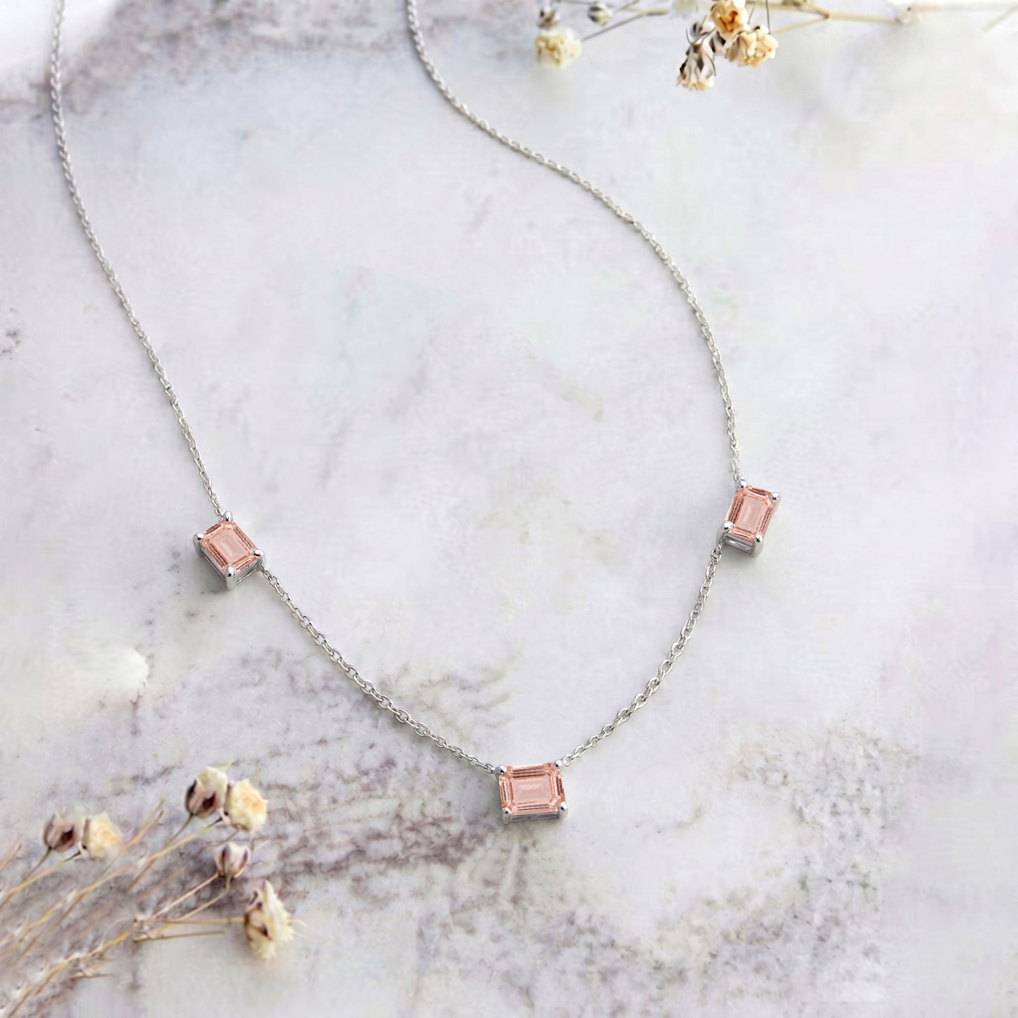 Minimalist Morganite necklace featuring soft blush pink gemstones.
