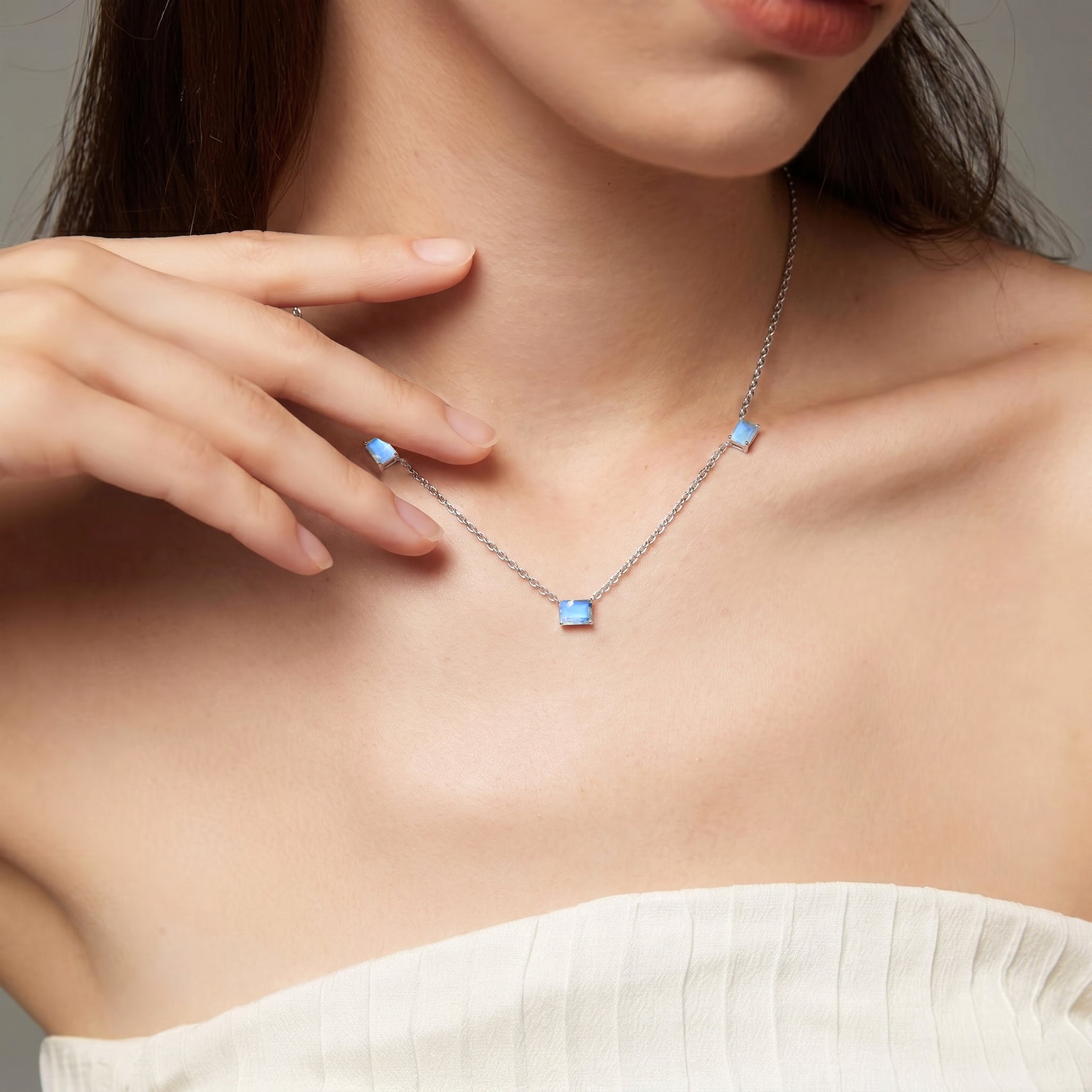 Elegant three stone Moonstone necklace with octagon-cut gemstones.
