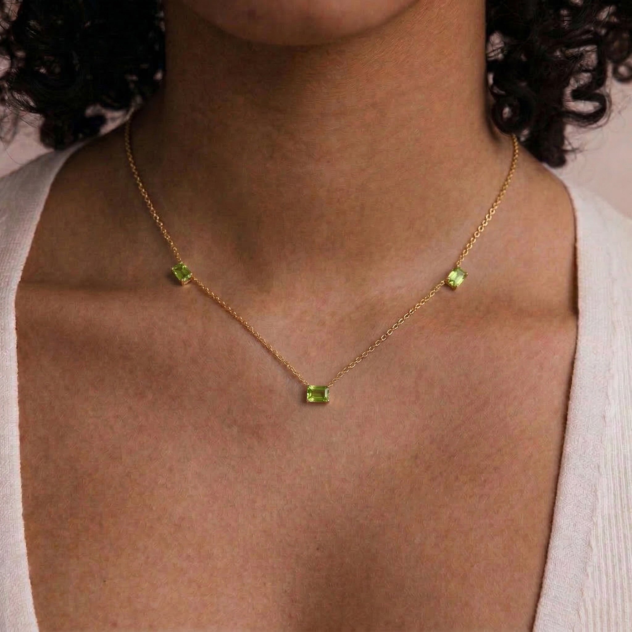 Handmade Peridot station necklace with green gemstones
