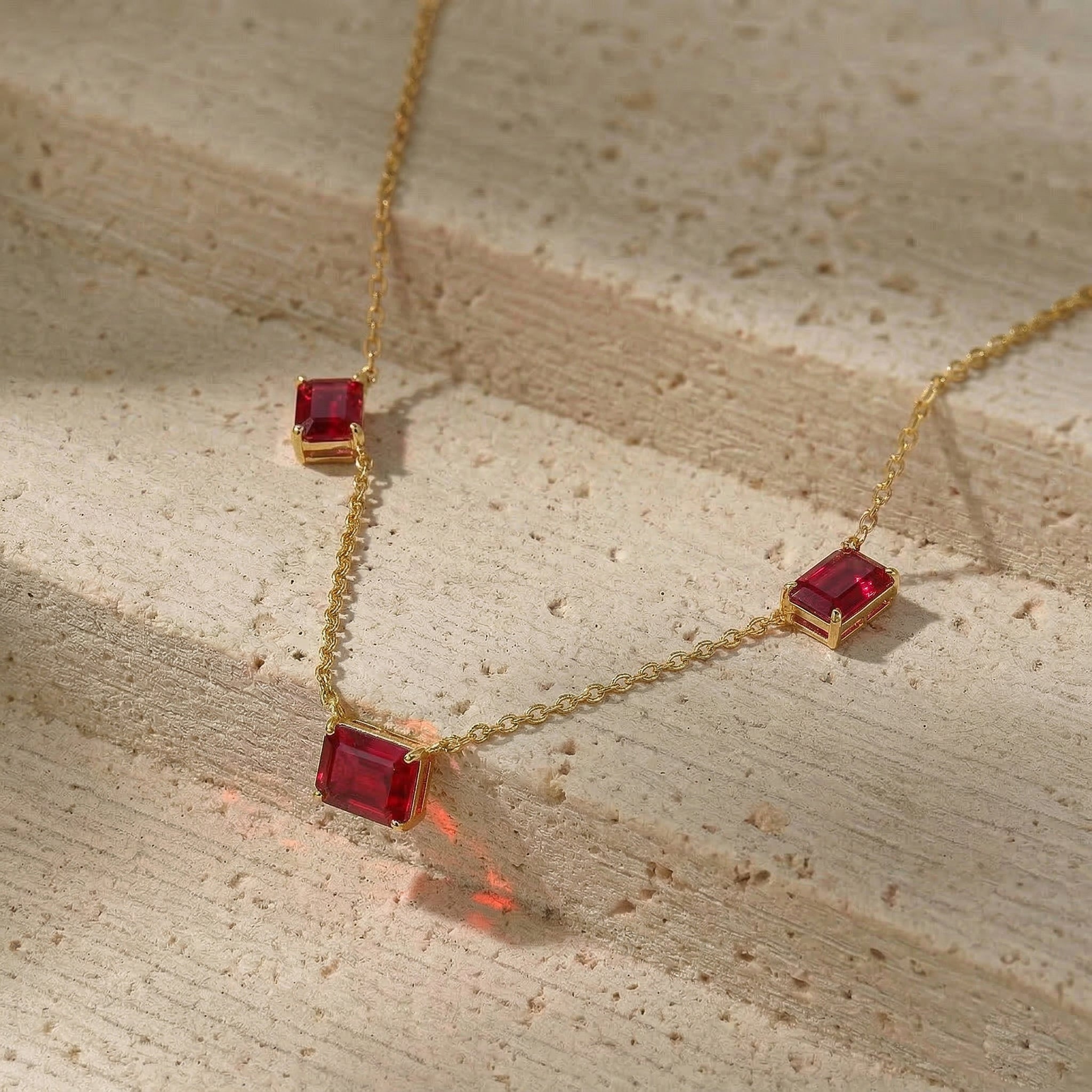 July birthstone Ruby necklace with elegant red gemstone station design
