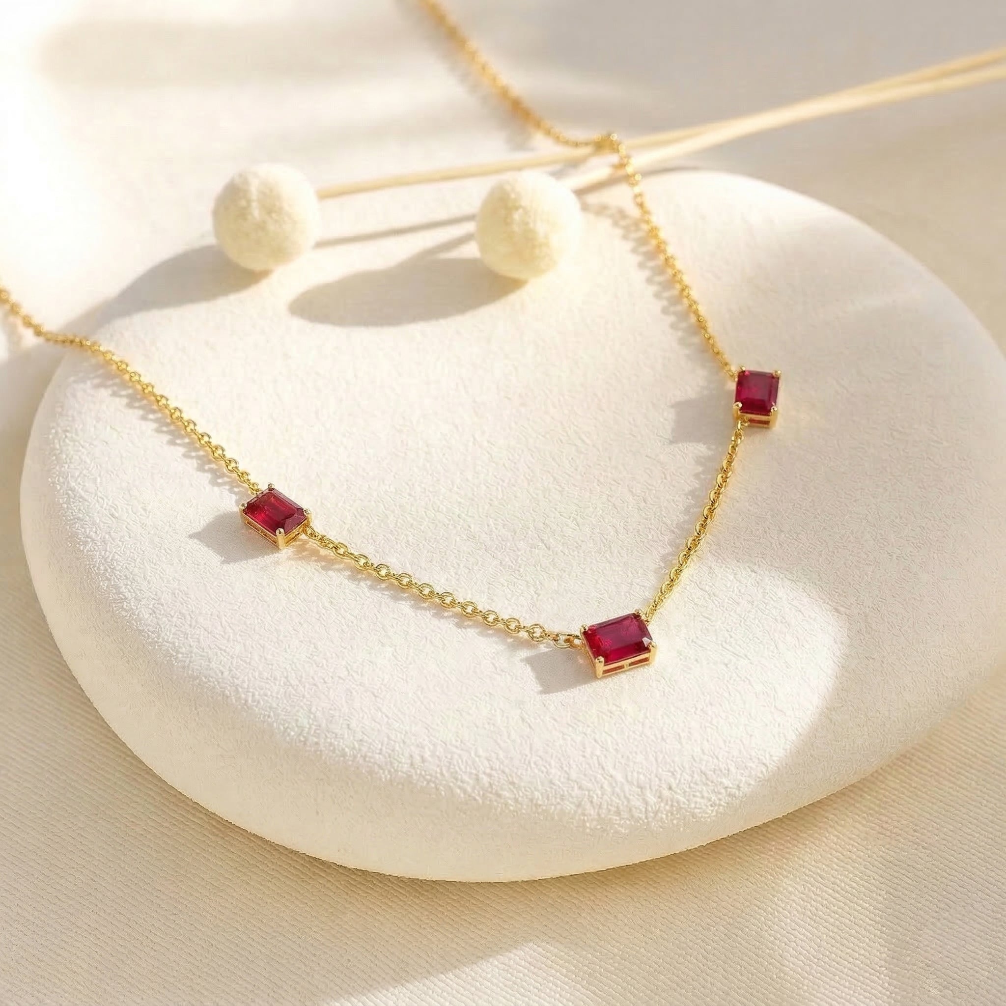 Luxury Ruby three stone necklace featuring natural red gemstone brilliance
