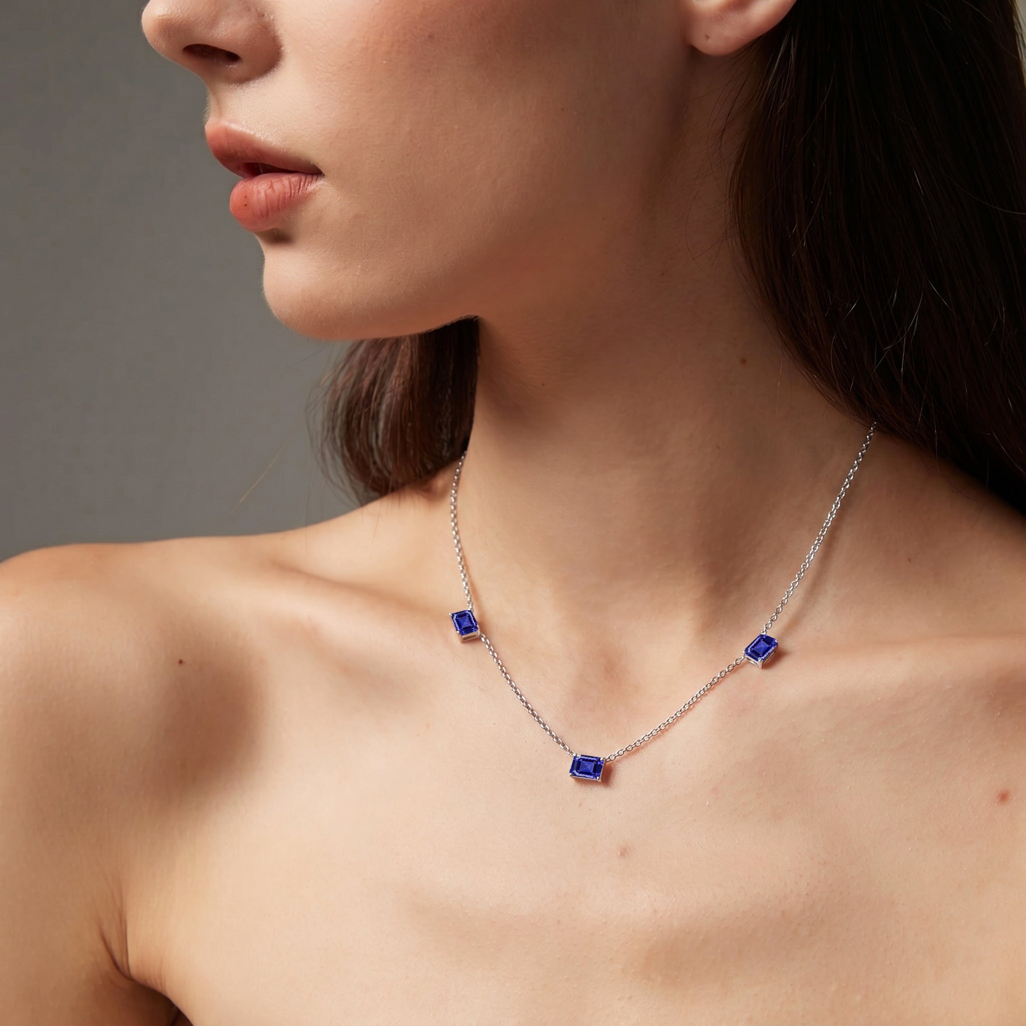 Octagon cut Tanzanite gemstone necklace in sterling silver jewelry
