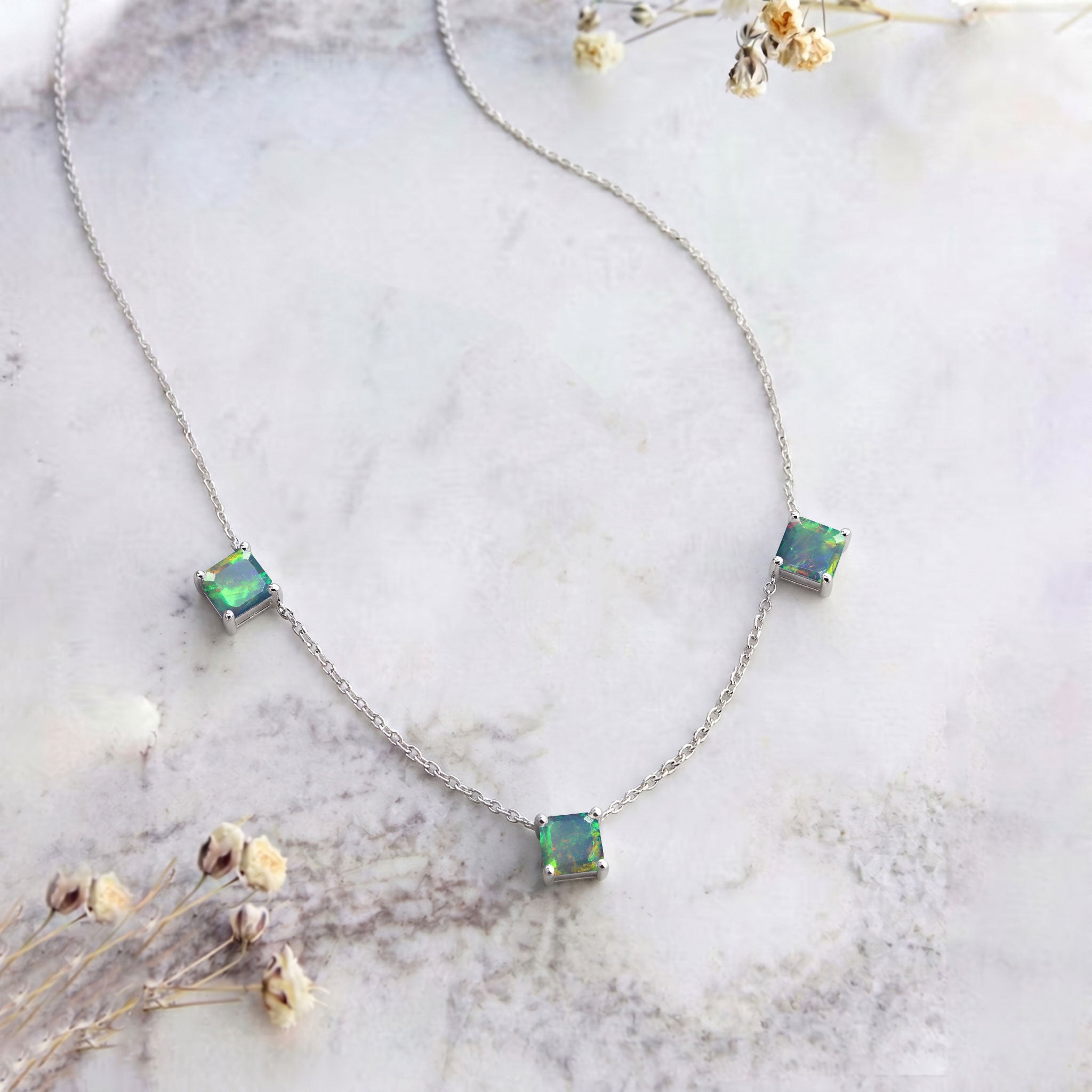Three stone Natural Black Opal necklace crafted in 925 sterling silver.
