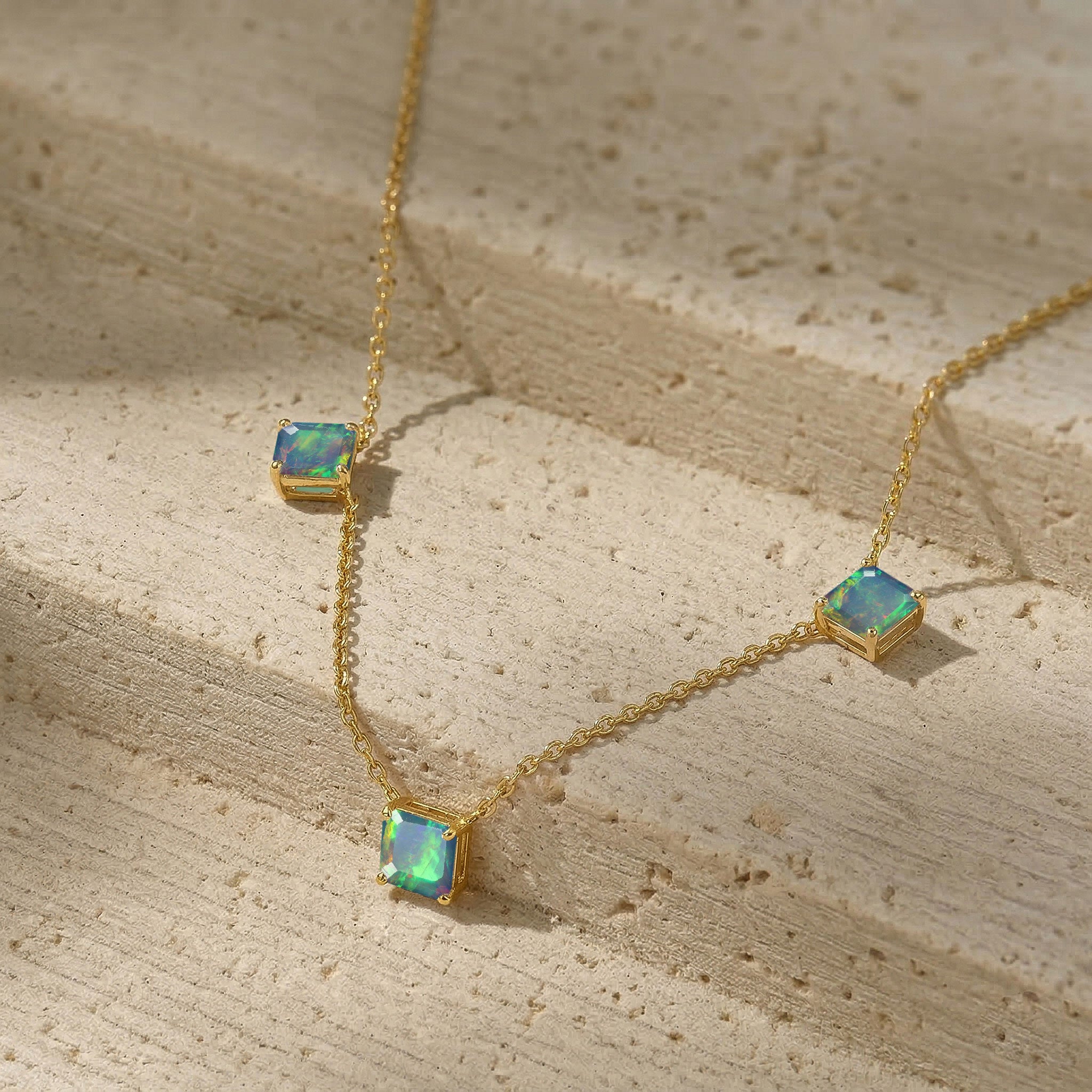 Fine jewelry Natural Black Opal necklace in sterling silver and yellow gold filled.
