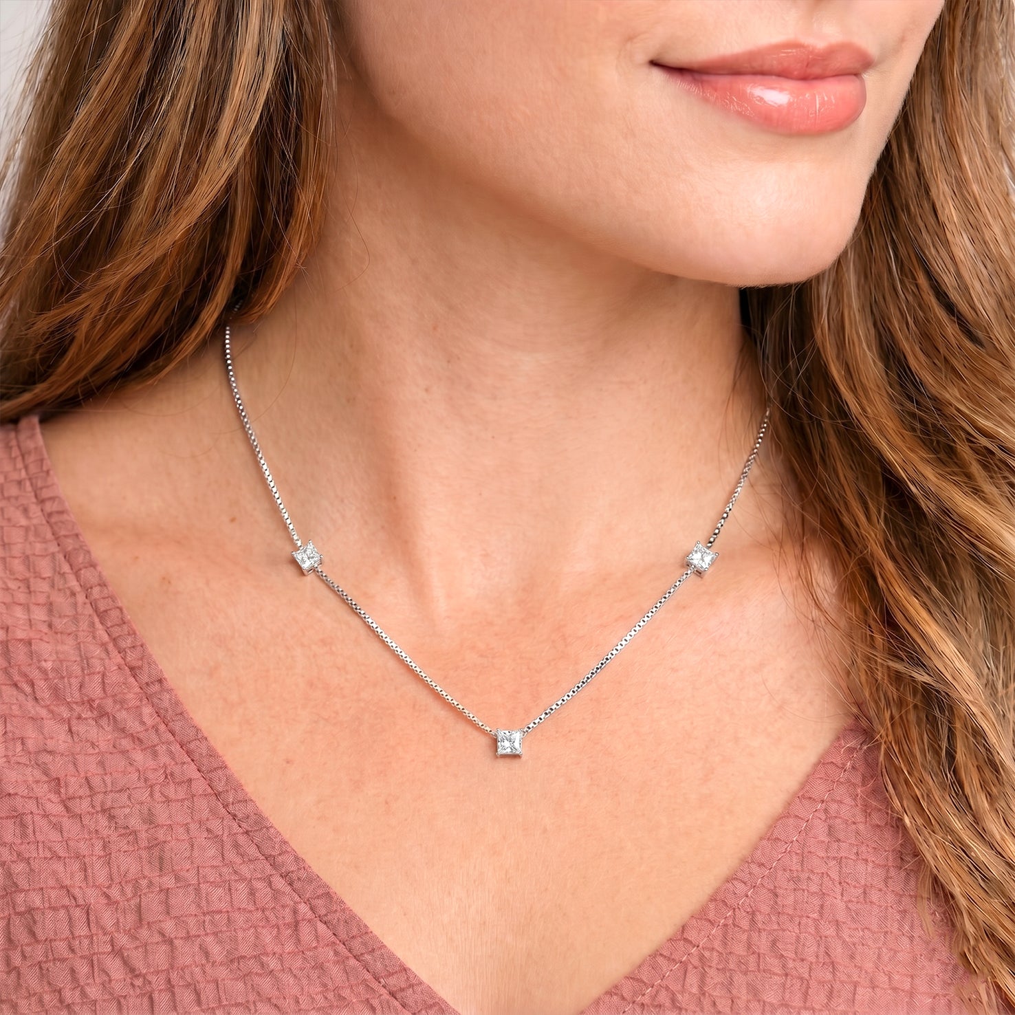 Modern Blue Topaz station necklace designed for layering and everyday wear.
