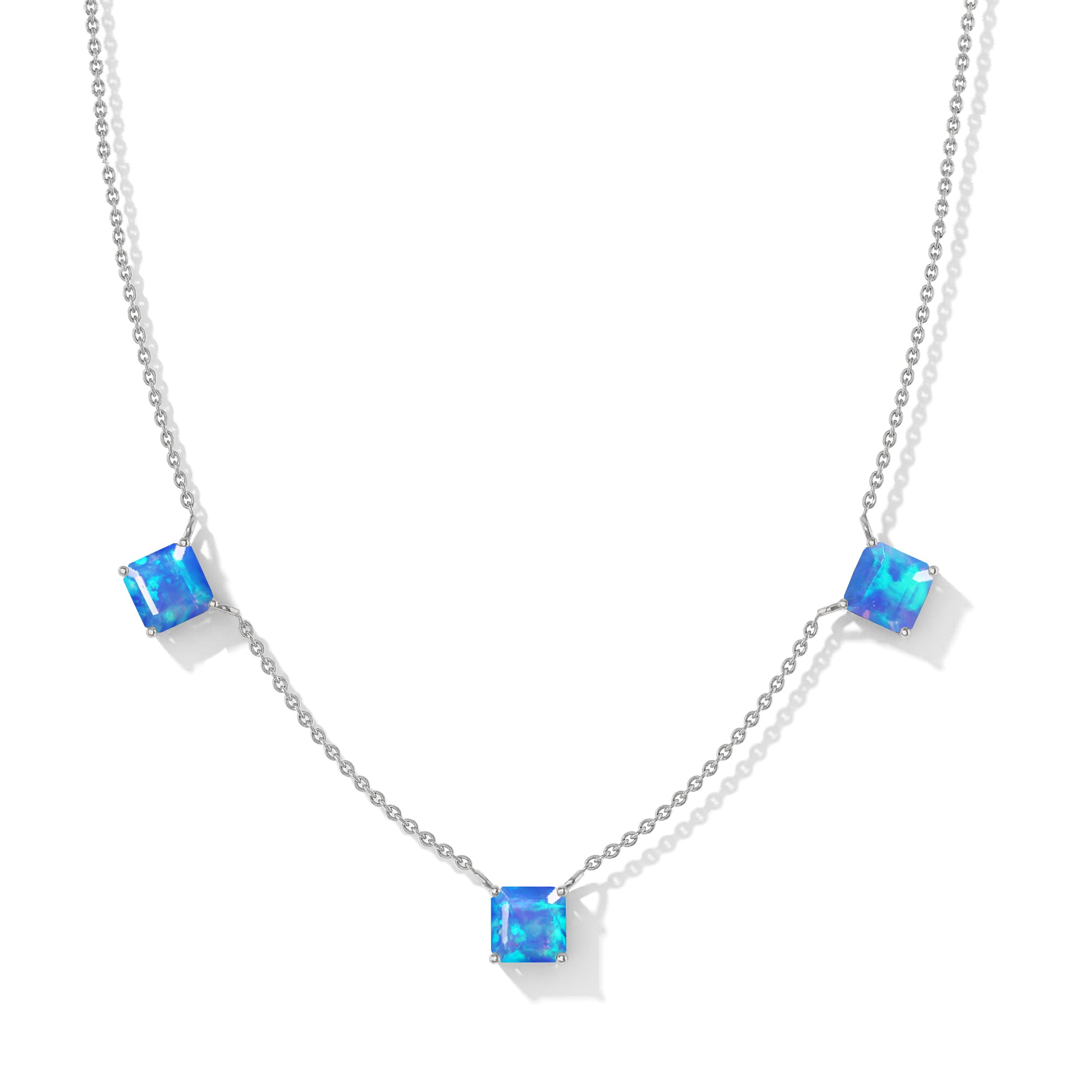 Dainty Natural Blue Opal station necklace featuring three Asscher cut gemstones.
