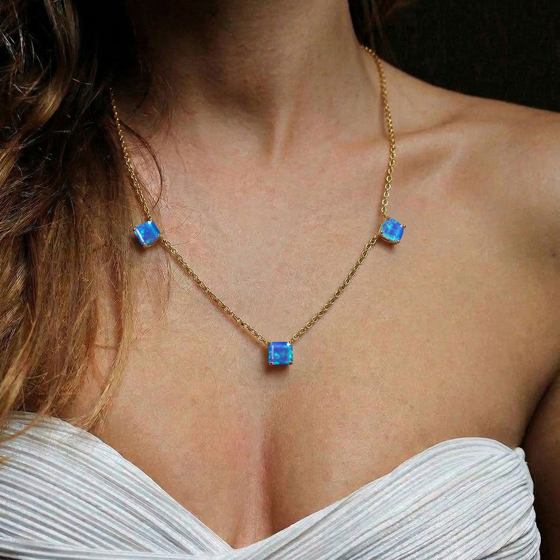 Three stone Natural Blue Opal necklace crafted in 925 sterling silver.
