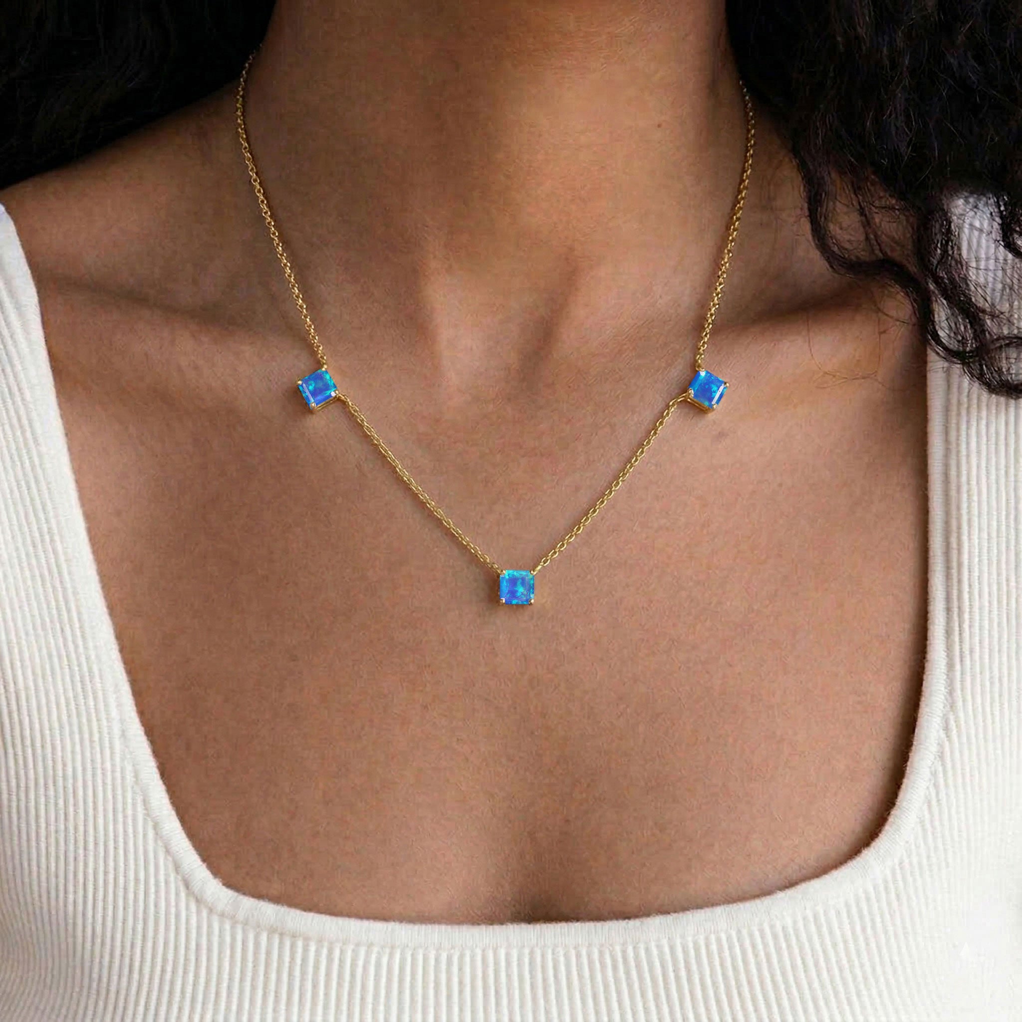 Genuine Natural Blue Opal gemstone necklace with an adjustable sterling silver chain.
