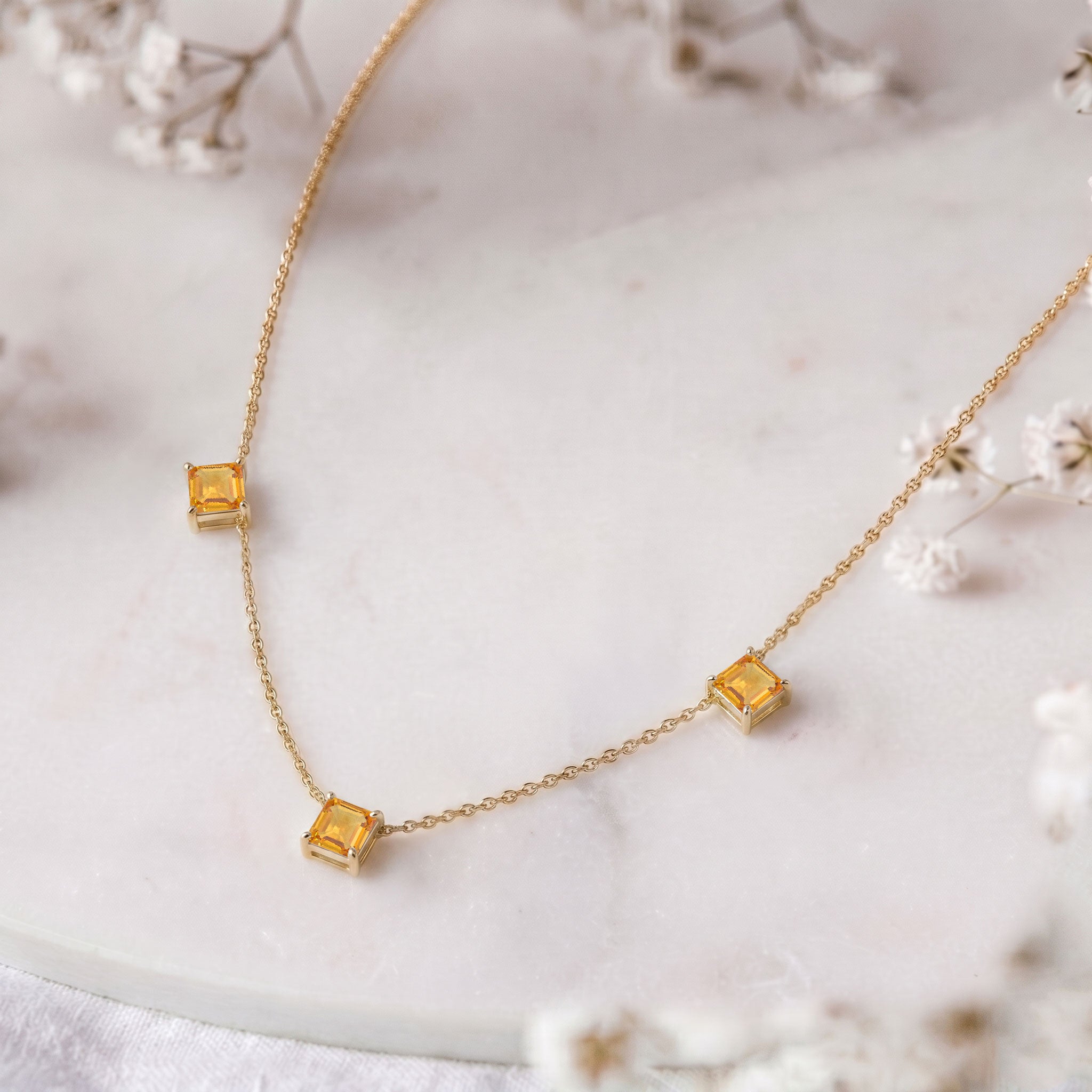 November birthstone necklace featuring sparkling Citrine Asscher cut gemstones.
