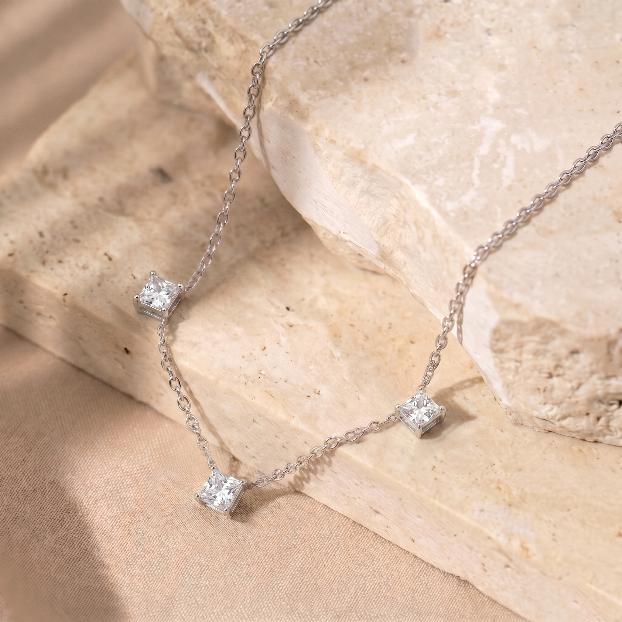 Women's Moissanite three stone necklace with premium 925 sterling silver and brilliant diamond alternative gemstones.
