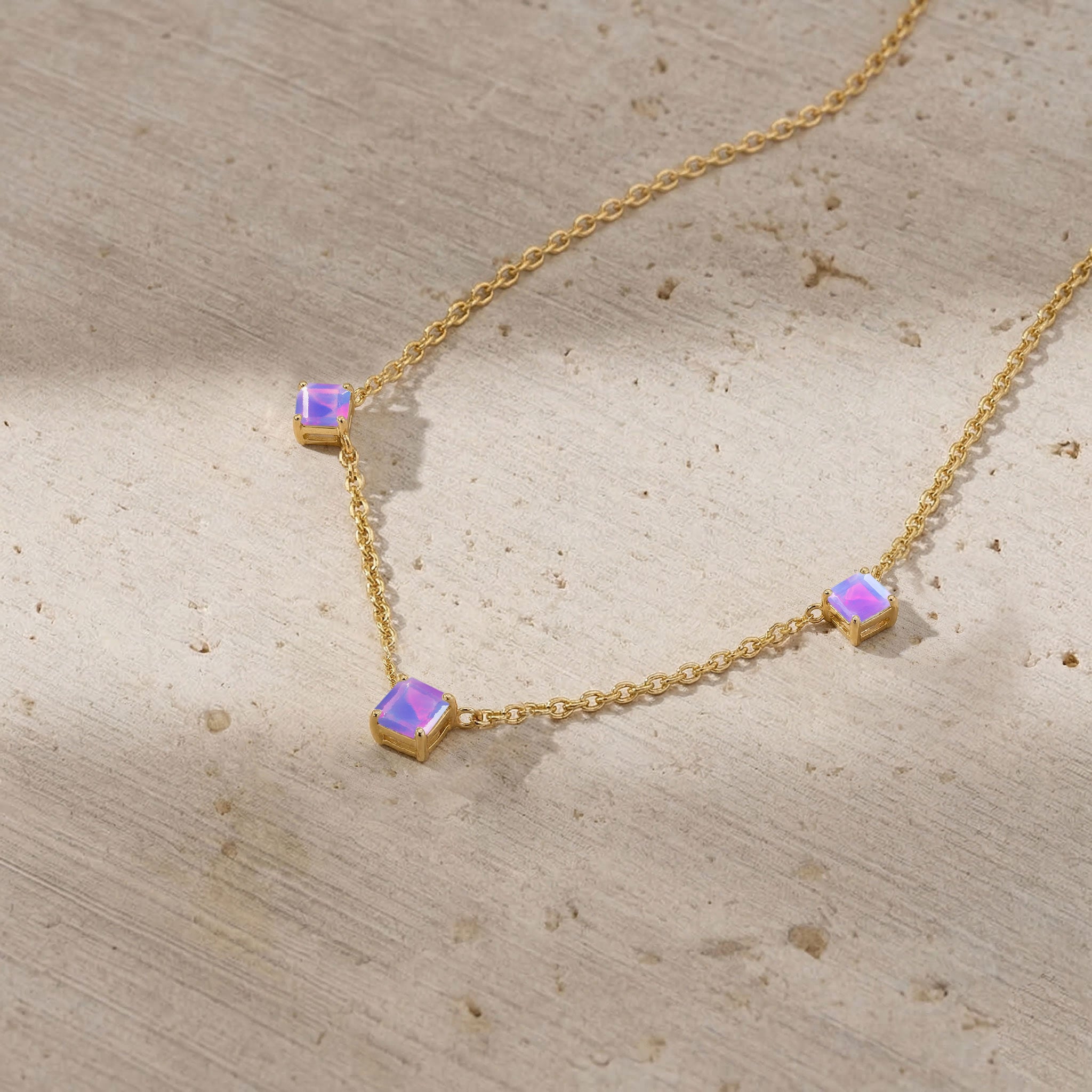 Modern three stone Lavender Opal necklace with Asscher cut gemstones, lightweight sterling silver chain, and timeless minimalist design.
