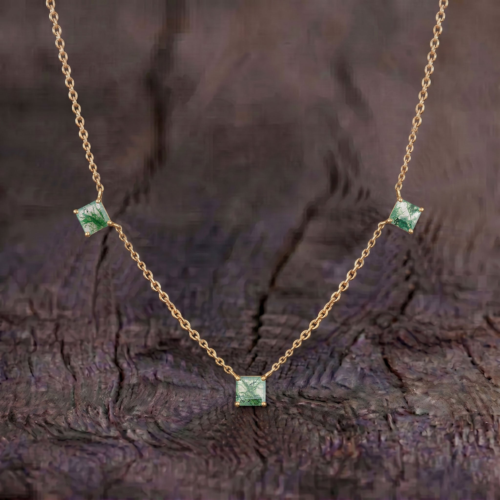 Green Moss Agate three stone necklace with Asscher cut gemstones and yellow gold filled details.
