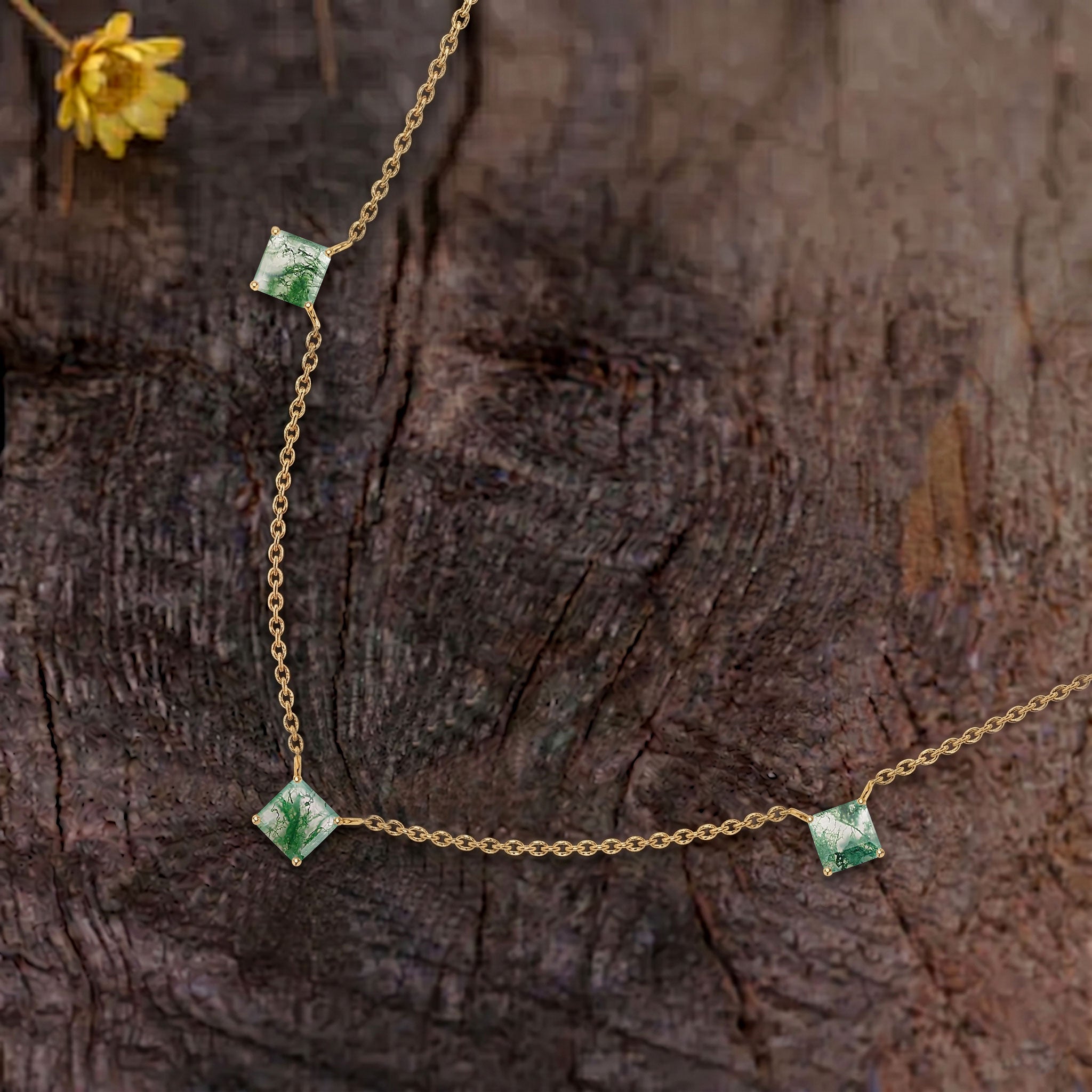 Fine gemstone jewelry featuring natural Moss Agate stones in an elegant station necklace design.
