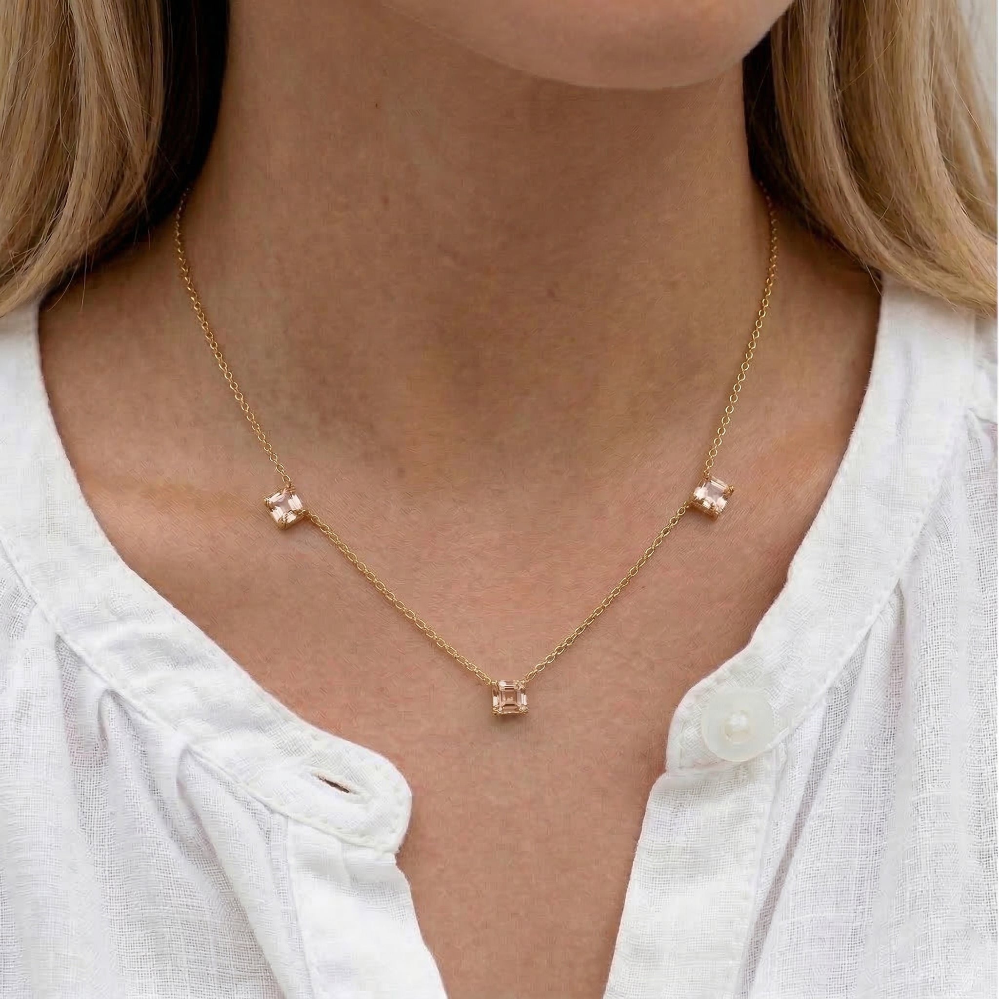 Delicate Morganite gemstone necklace with three Asscher cut stones.
